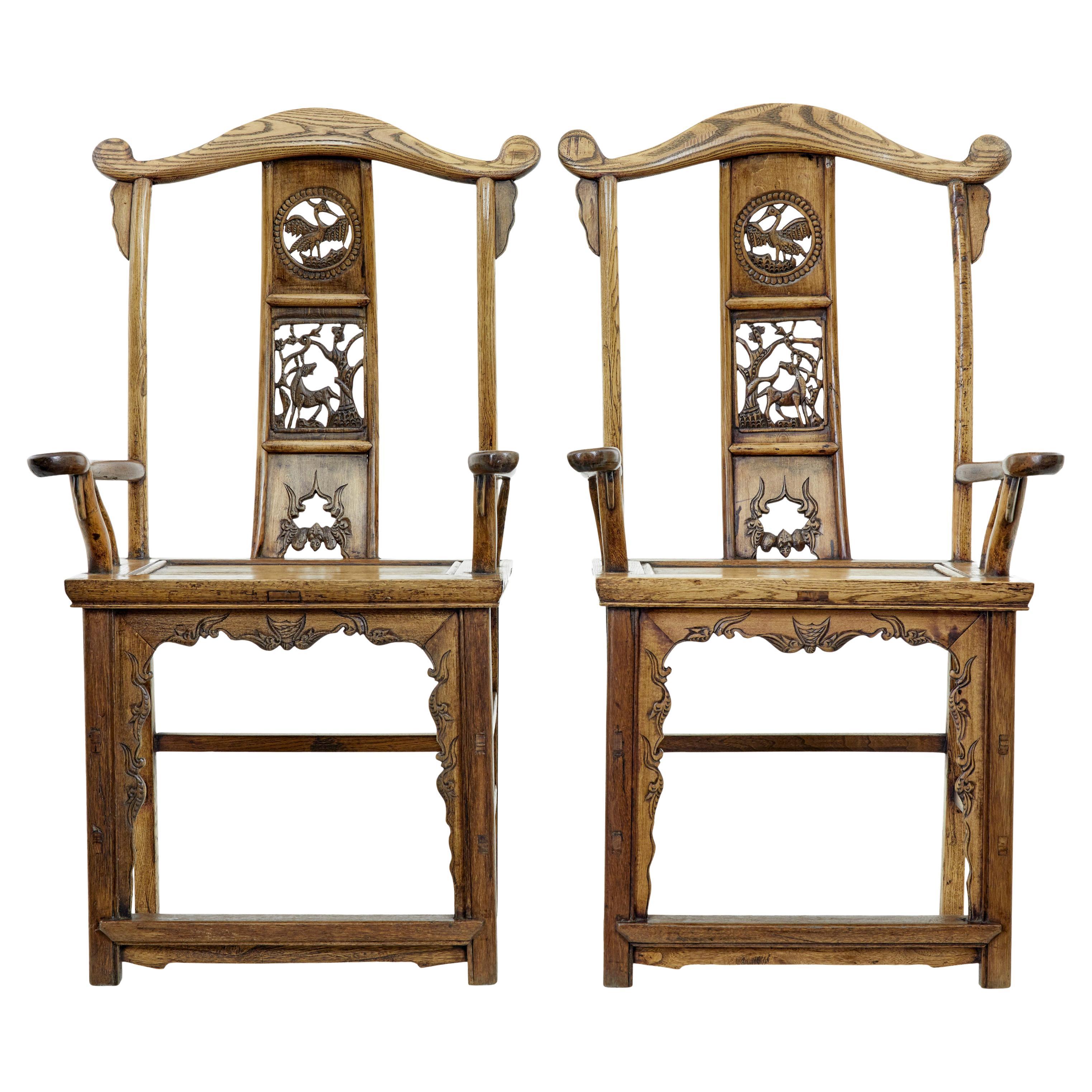 Pair of mid 19th century carved elm Chinese yoke back armchairs