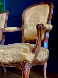 Pair of Mid-19th Century French Carved Fauteuils Louis XVI Armchairs