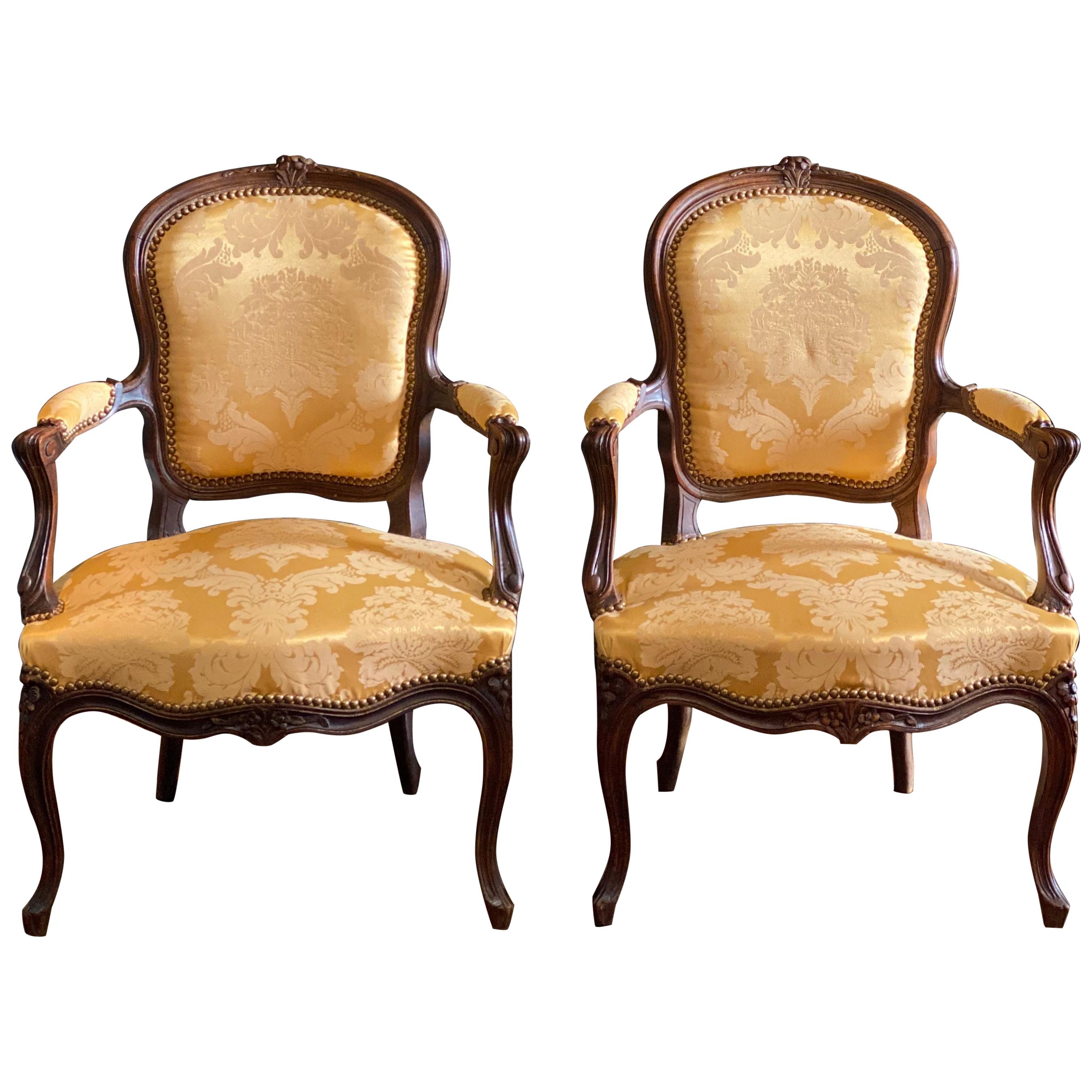 Pair of Mid-19th Century French Carved Fauteuils Louis XVI Armchairs