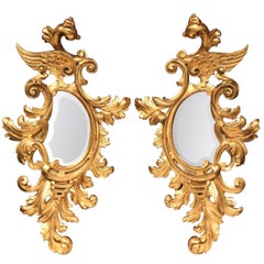 Pair of Mid-19th Century French Louis XV Carved Giltwood Beveled Mirrors