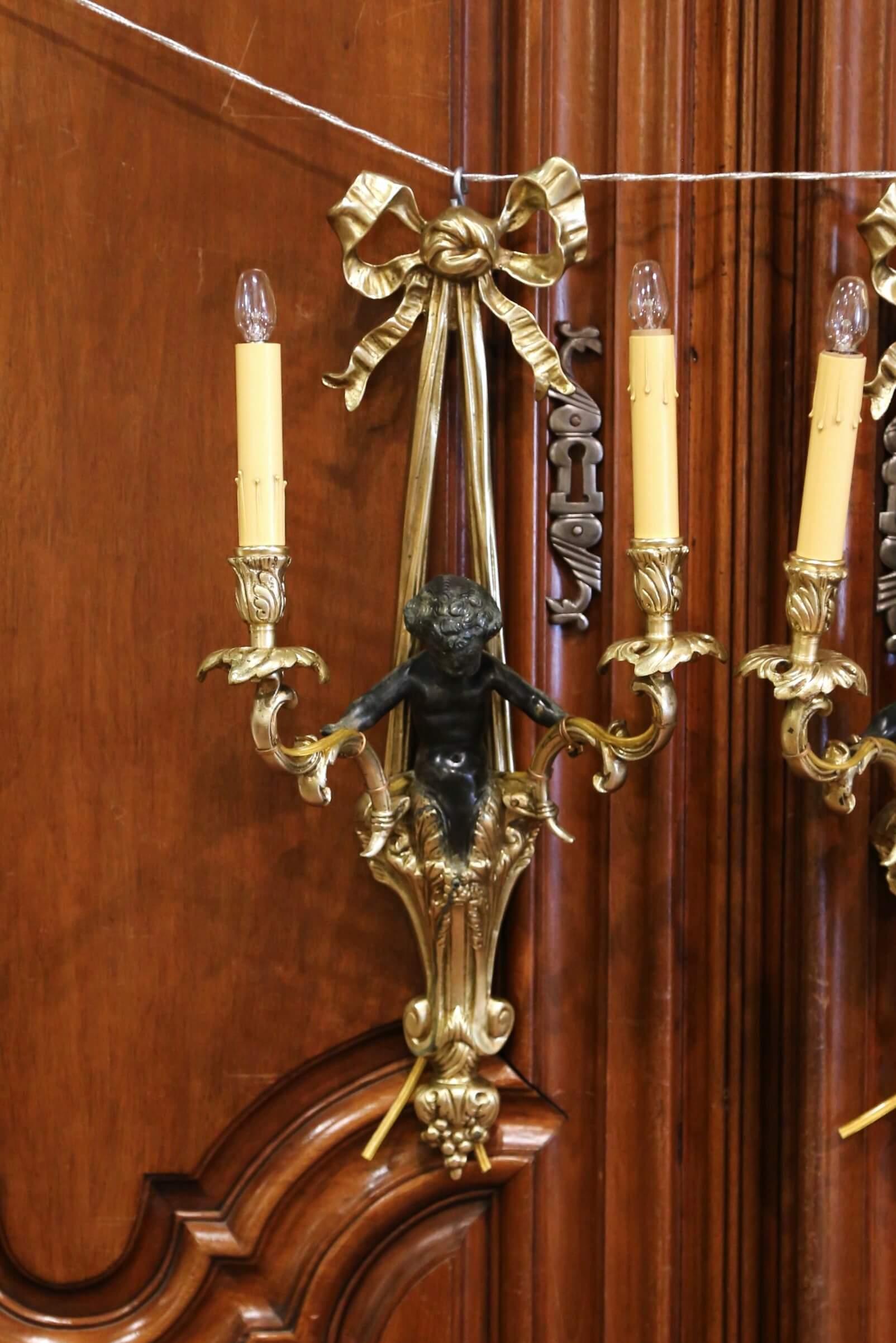 Hand-Crafted Pair of Mid-19th Century French Louis XVI Bronze Dore Wall Sconces with Cherubs