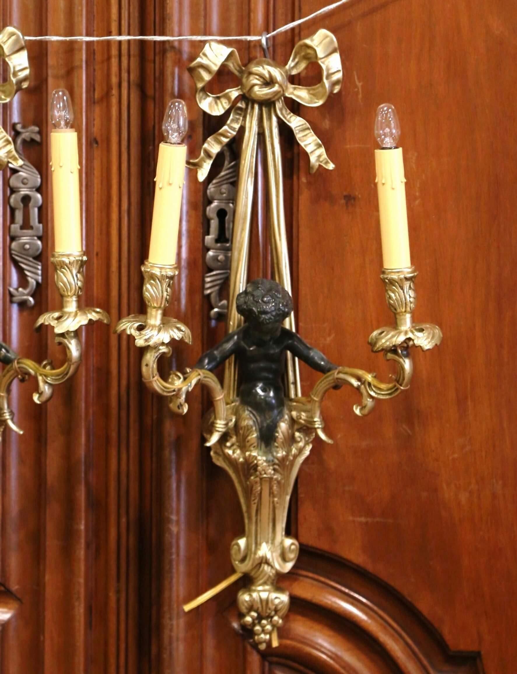 Pair of Mid-19th Century French Louis XVI Bronze Dore Wall Sconces with Cherubs In Excellent Condition In Dallas, TX