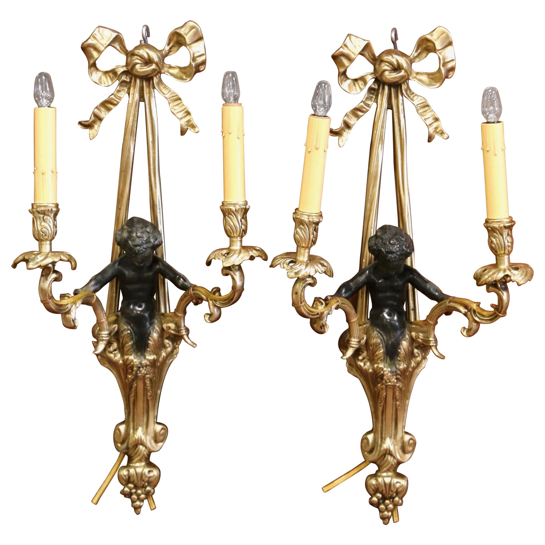Pair of Mid-19th Century French Louis XVI Bronze Dore Wall Sconces with Cherubs