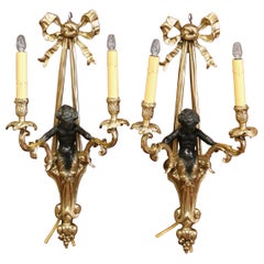 Pair of Mid-19th Century French Louis XVI Bronze Dore Wall Sconces with Cherubs