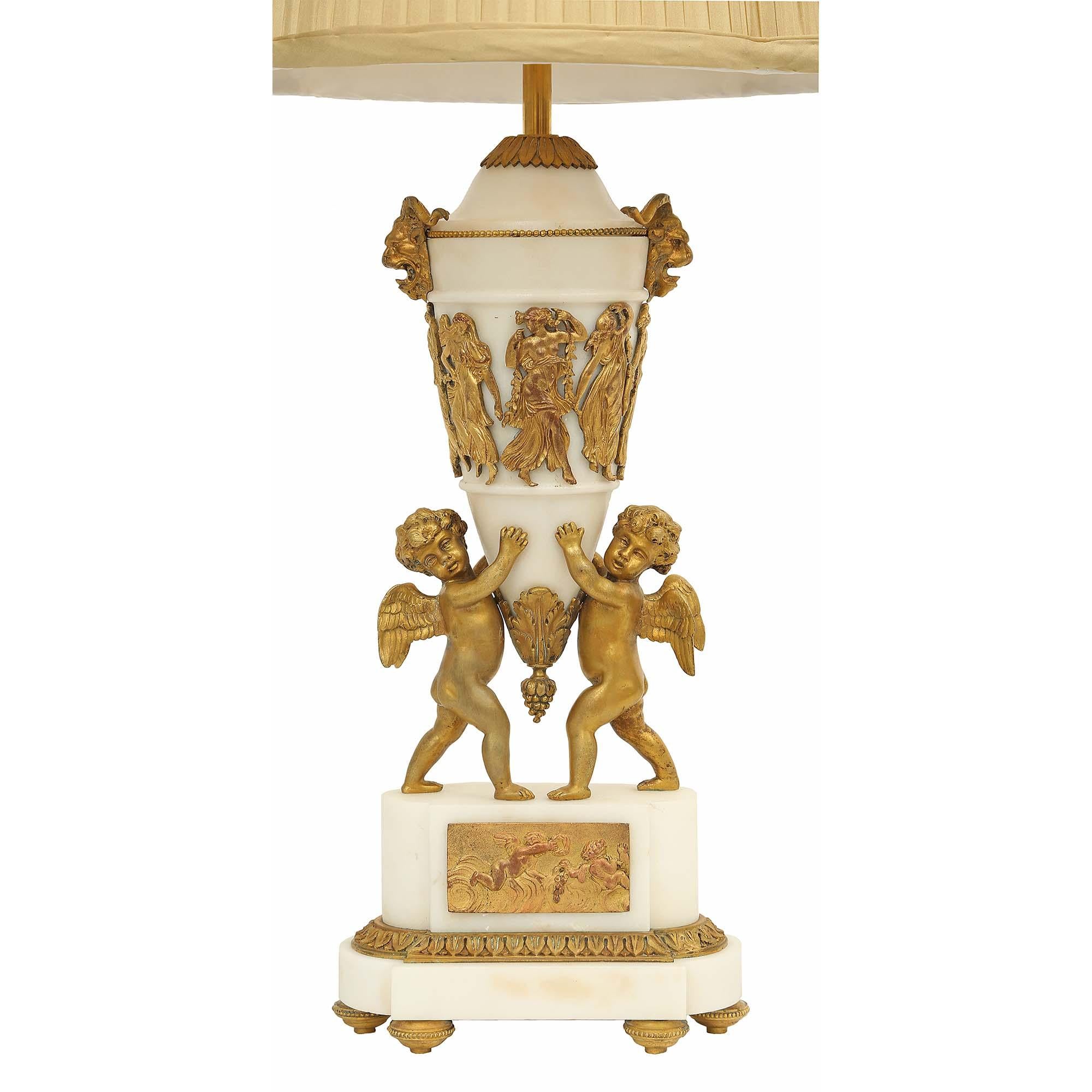Ormolu Pair of Mid-19th Century French Louis XVI St. Urns Mounted into Lamps For Sale