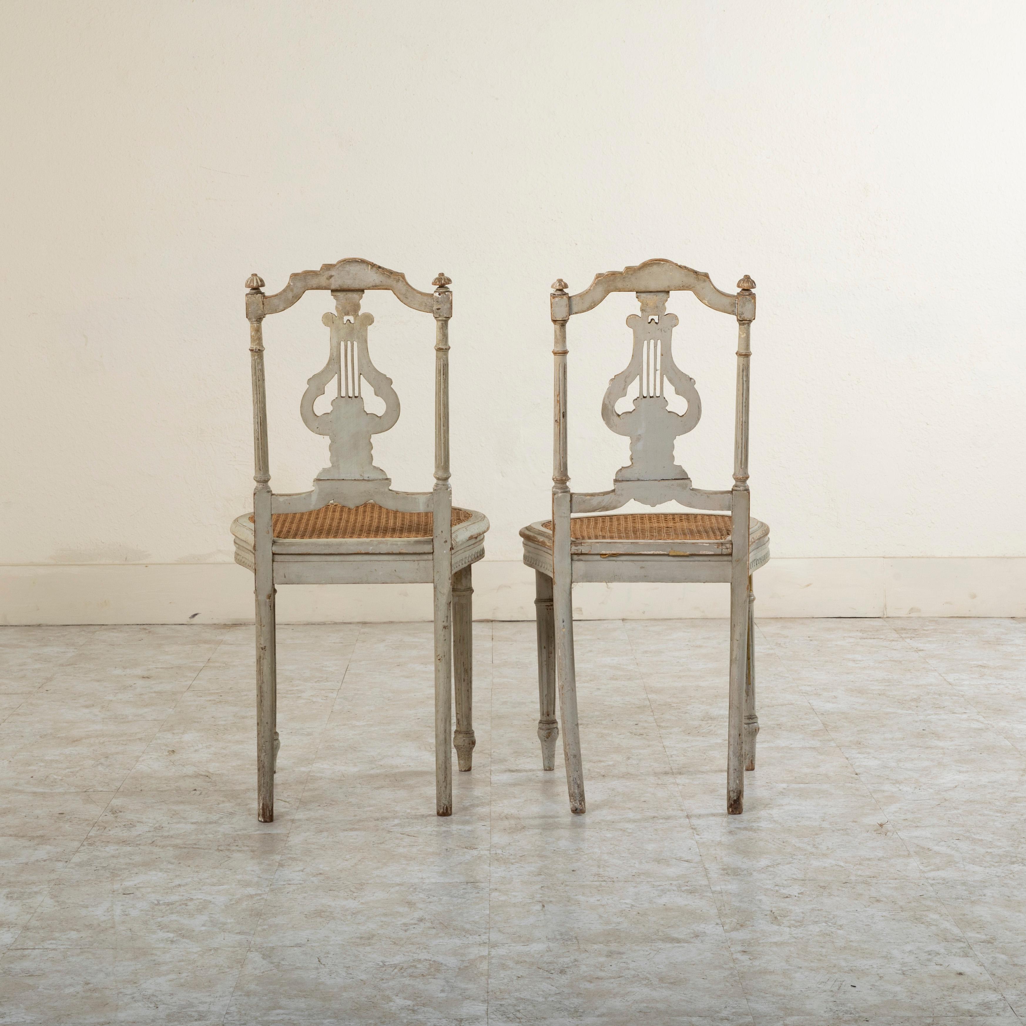 Cane Pair of Mid-19th Century French Louis XVI Style Painted Opera Chairs Side Chairs For Sale