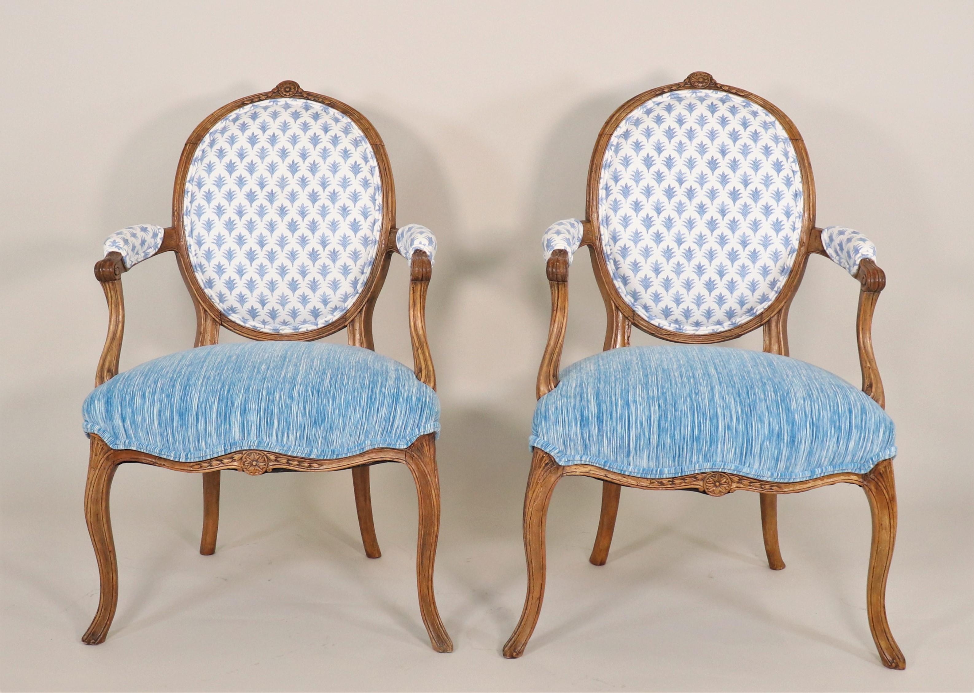 Pair of mid-19th century French Régence style Fauteuils: full of French charm, this French Régence Style pair of armchairs have been updated with modern fabrics that are in keeping with the spirit of the period. French Régence was a brief period