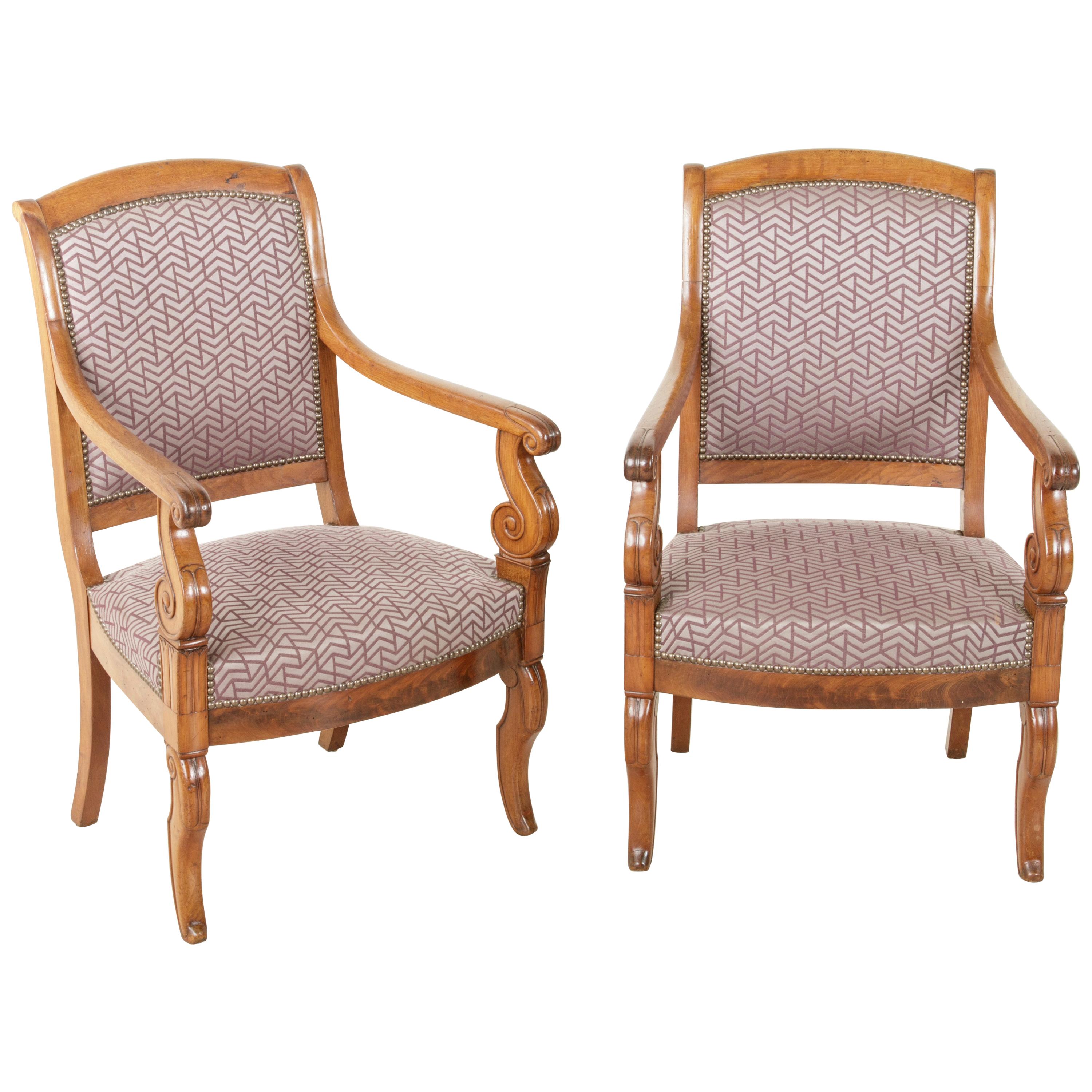 Pair of Mid-19th Century French Restauration Period Walnut Armchairs or Bergeres