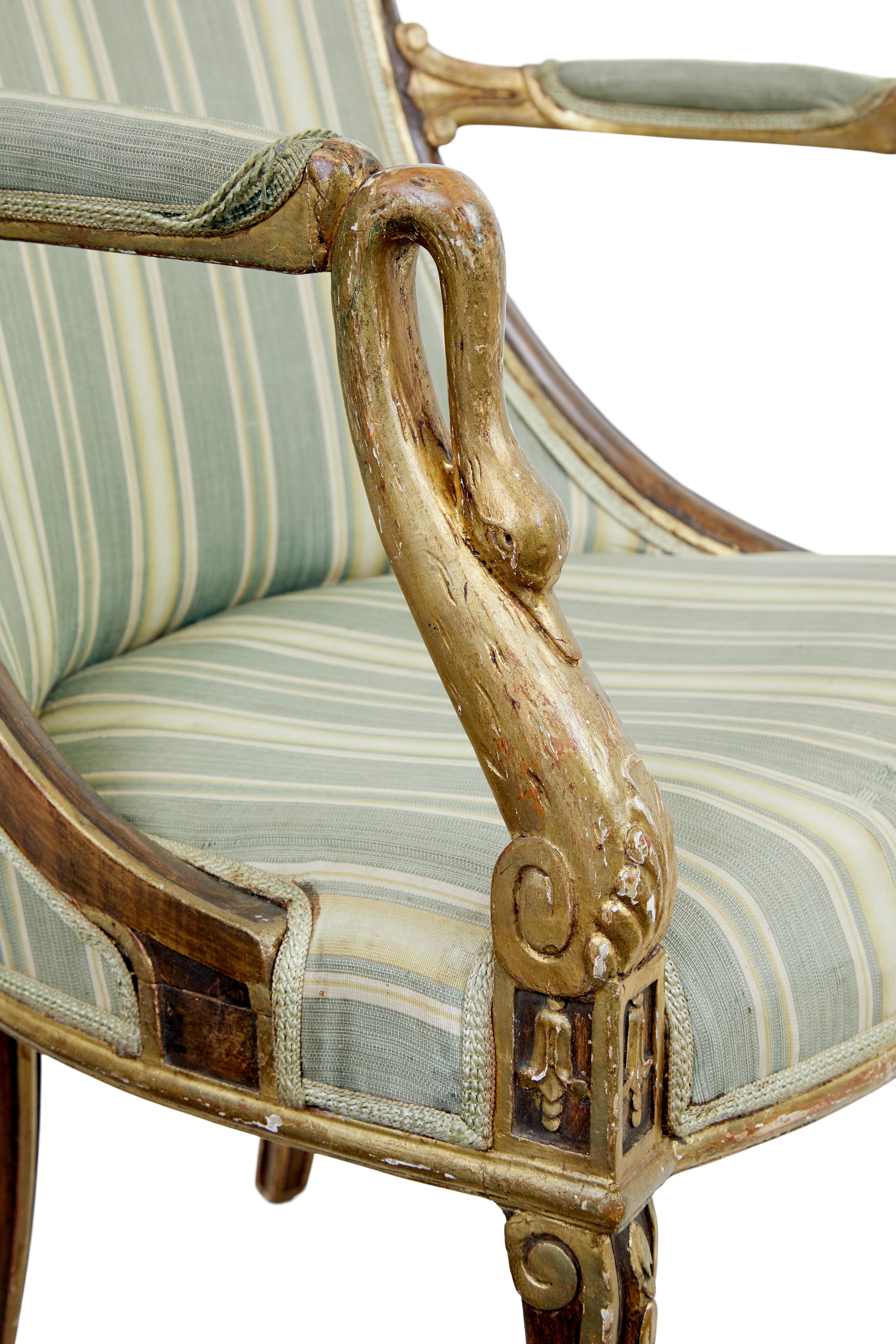 French Provincial Pair of mid 19th century French walnut and gilt armchairs