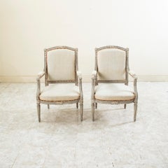 Pair of Mid-19th Century Hand Carved French Louis XVI Style Painted Armchairs