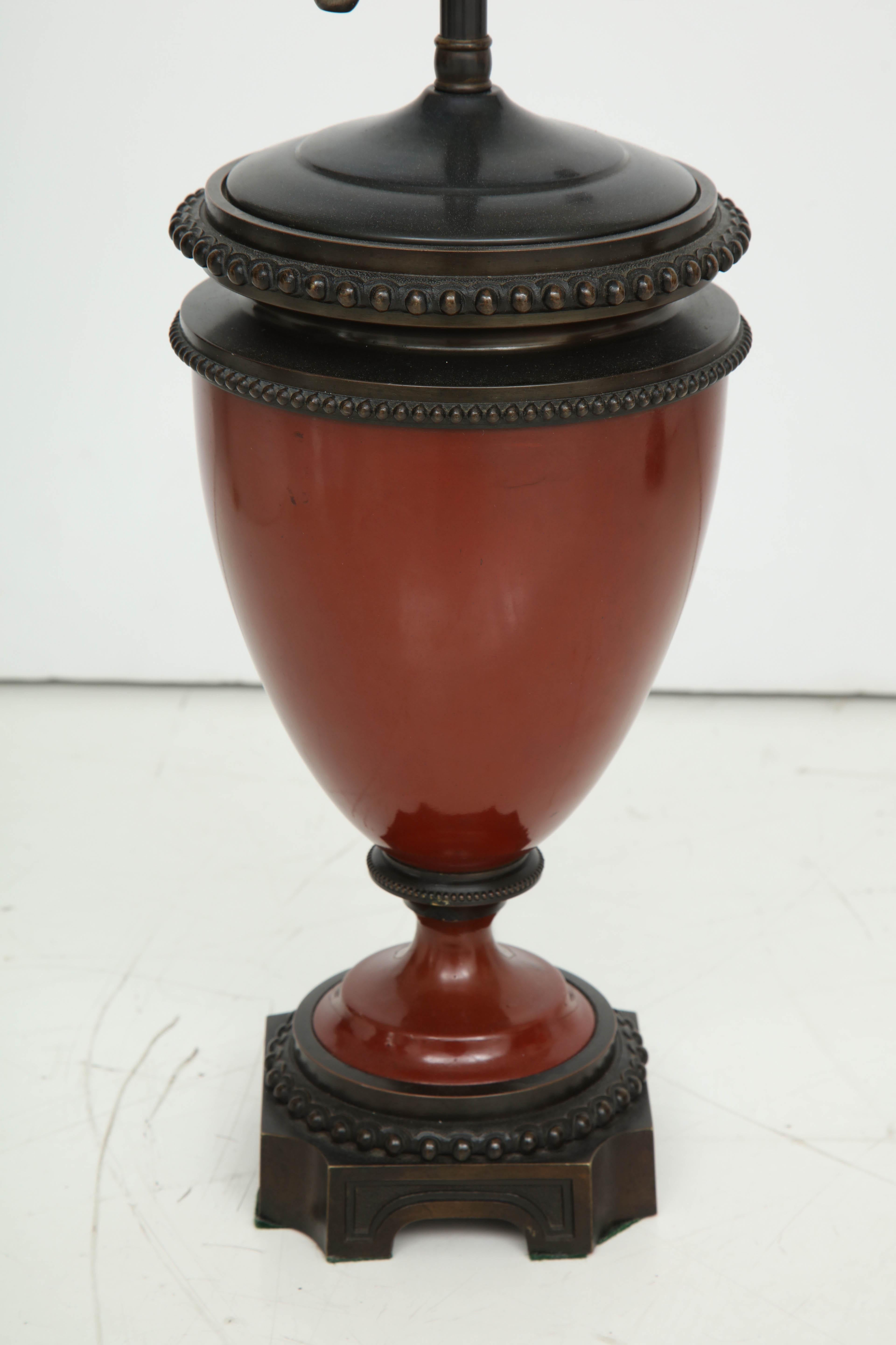 Pair of Mid-19th Century Red Porcelain and Patinated Bronze Vase Shaped Lamps In Excellent Condition For Sale In New York, NY