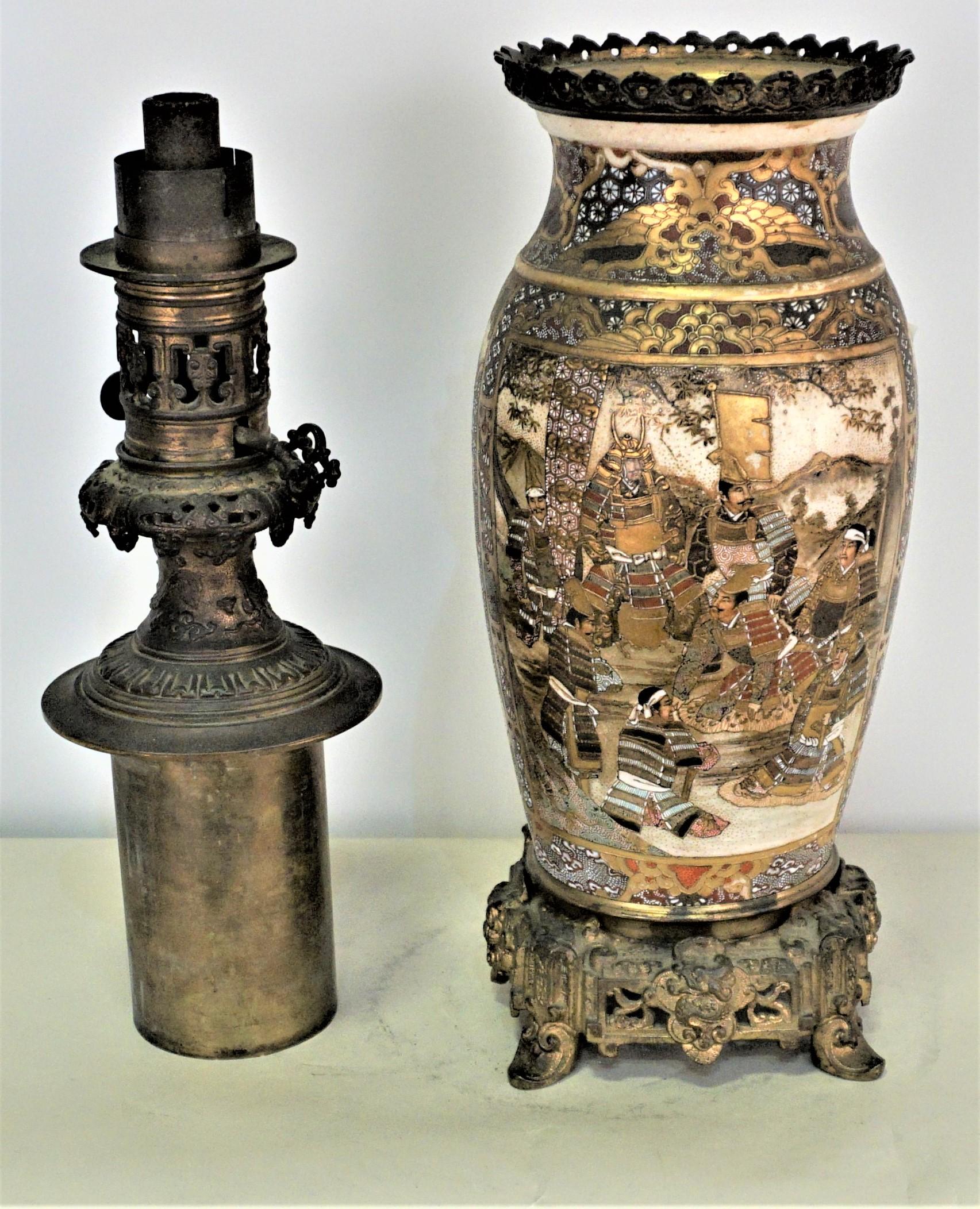 Magnificent pair of Japanese gold Satsuma with hand painted Samurai warriors and court seen mounted in French bronze hardware as oil lamps.
Satsuma porcelain was well know in Western world and highly sought after and some were used as base for oil