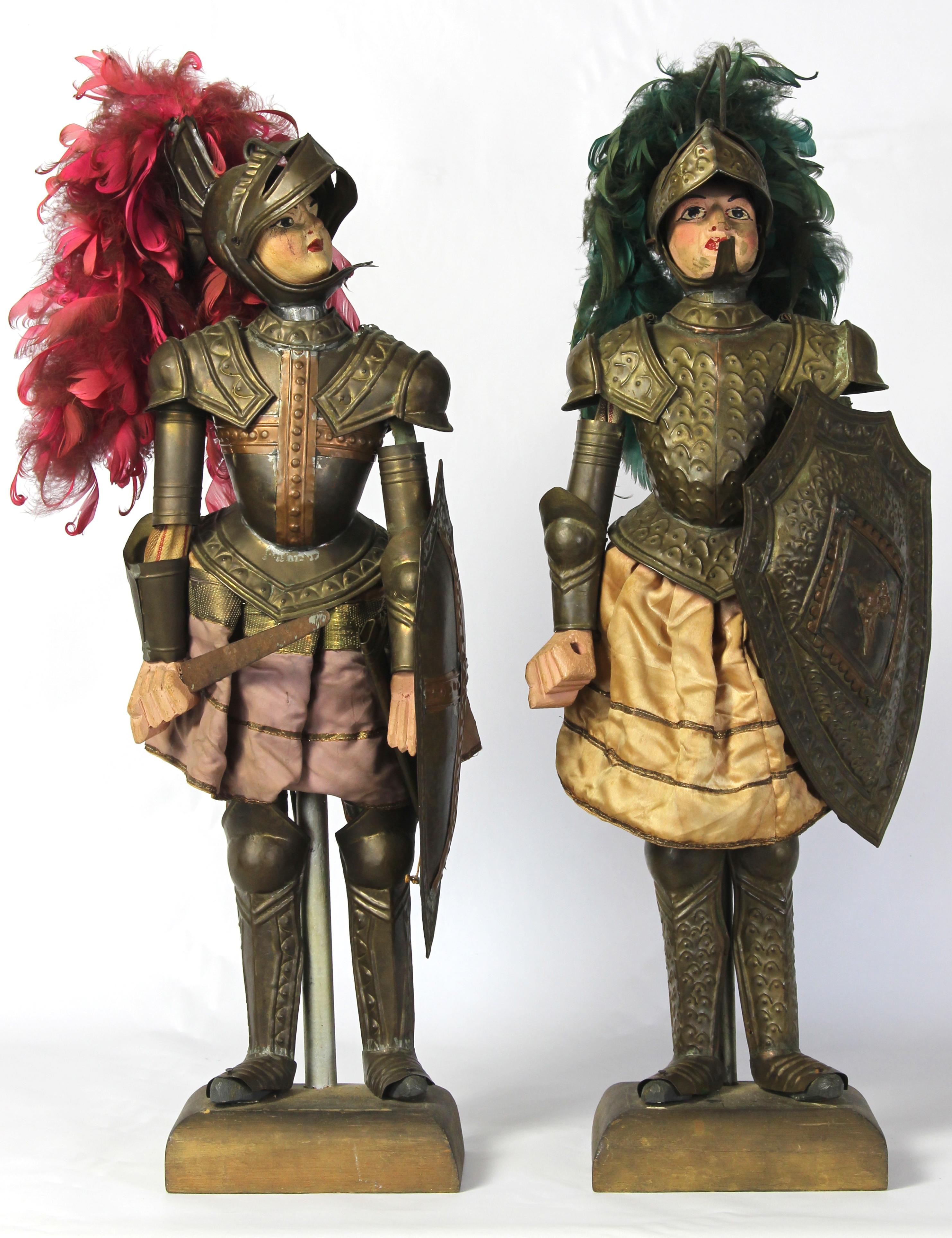 A charming pair of mid-19th century. Sicilian marionettes dressed in full suit of armor complete with brightly colored plumes.