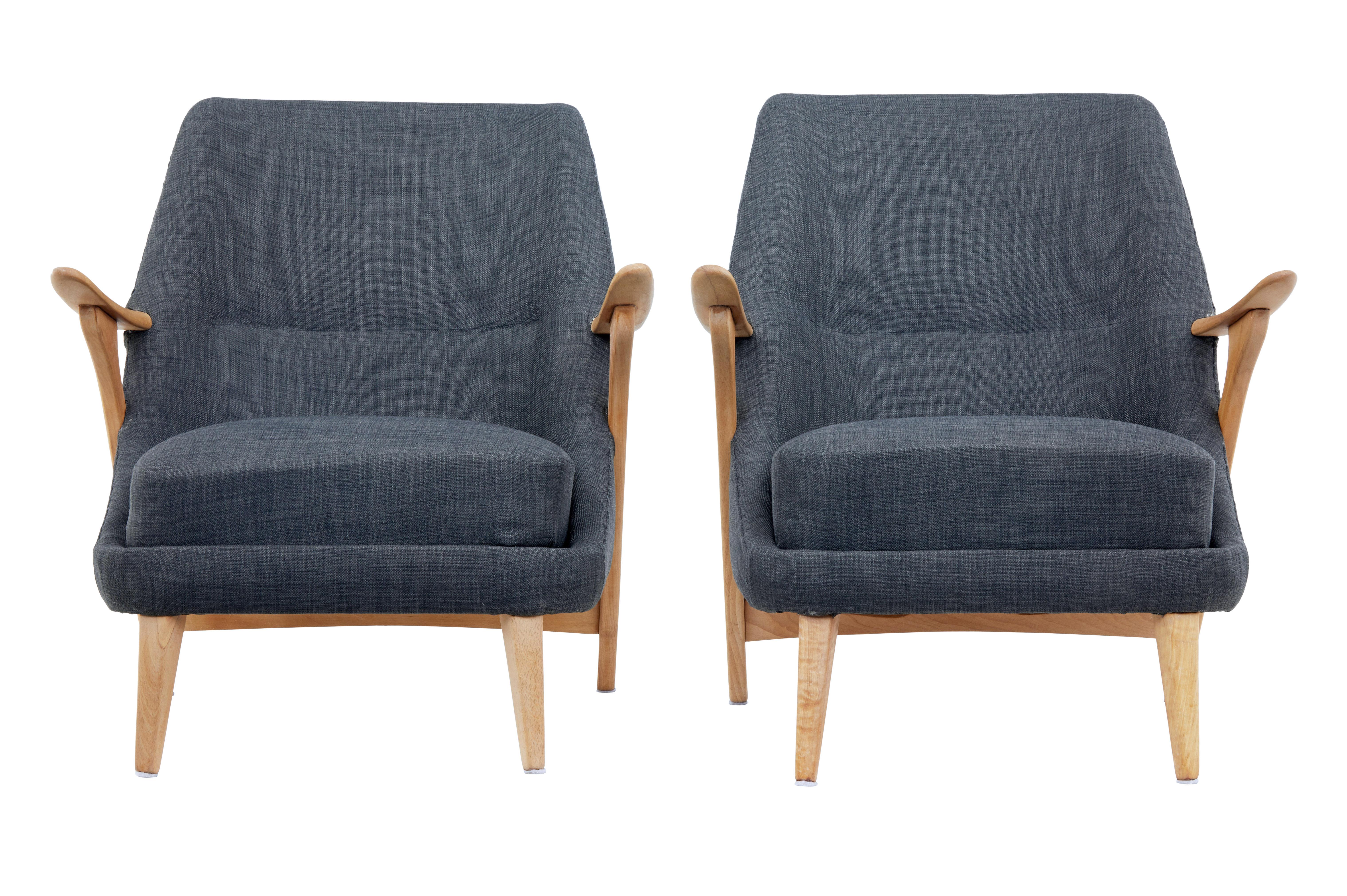 Fine quality pair of beech armchairs designed by Svante Skogh for Säffle Möbelfabrik, circa 1950.

Skogh worked for a number of furniture producers during the 1950s and 1960s, known for his flowing lines these chairs were designed for Seffle