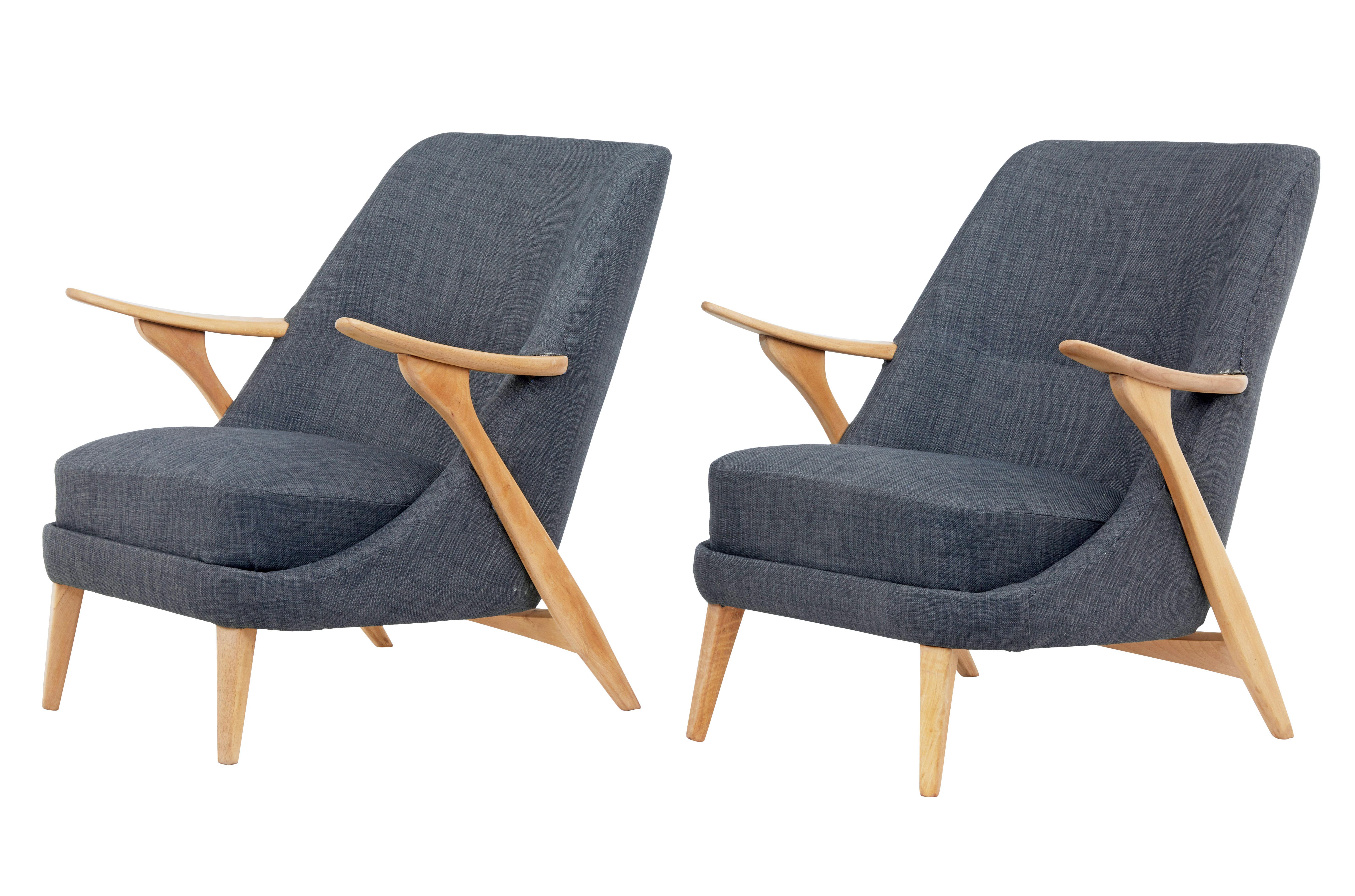 Fine quality pair of beech armchairs designed by Svante Skogh for Seffle Mobelfabrik, circa 1950.

Skogh worked for a number of furniture producers during the 1950s and 1960s, known for his flowing lines these chairs were designed for Seffle