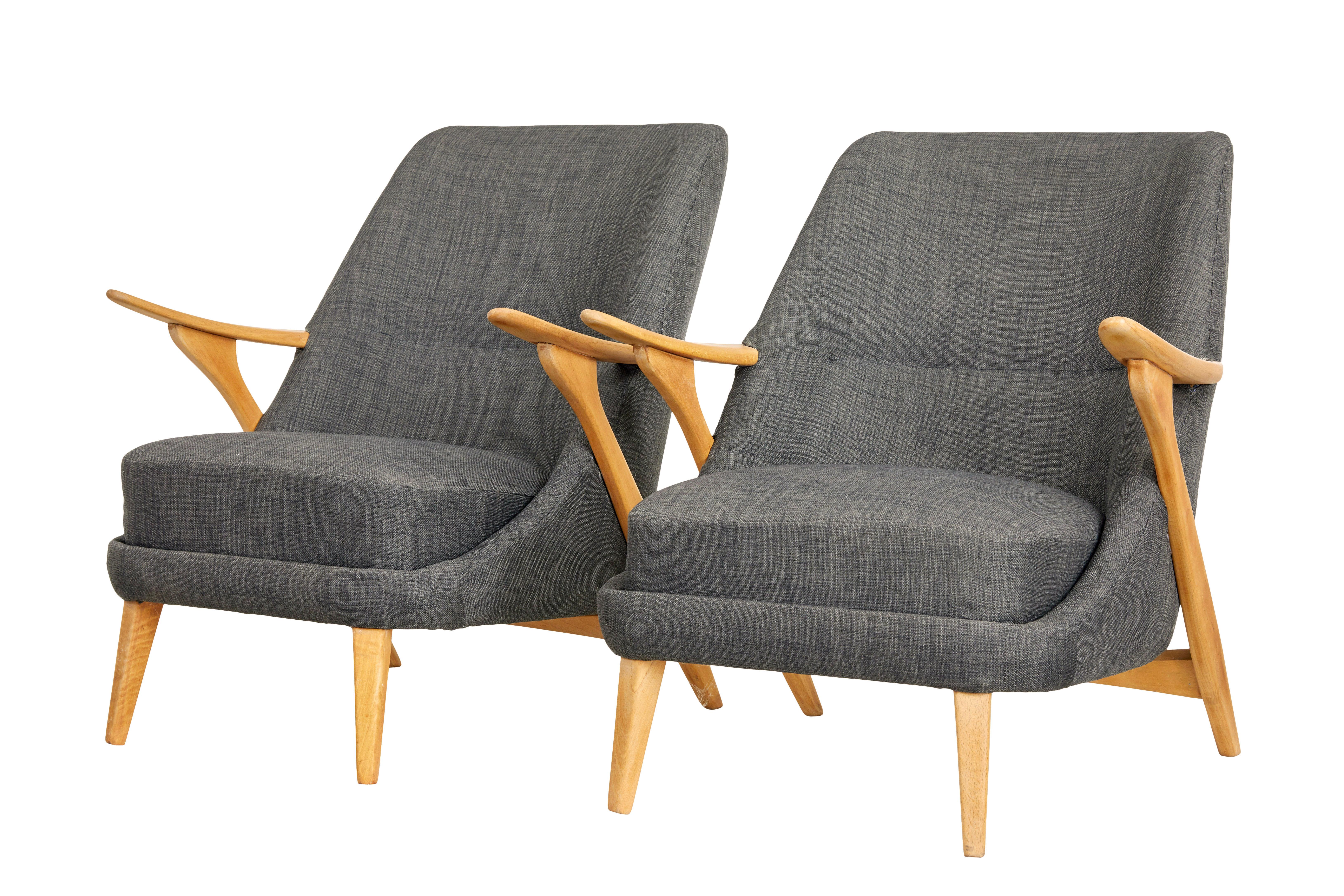 Fine quality pair of beech armchairs designed by svante skogh for seffle mobelfabrik, circa 1960.

Skogh worked for a number of furniture producers during the 1950's and 1960's, known for his flowing lines these chairs were designed for seffle