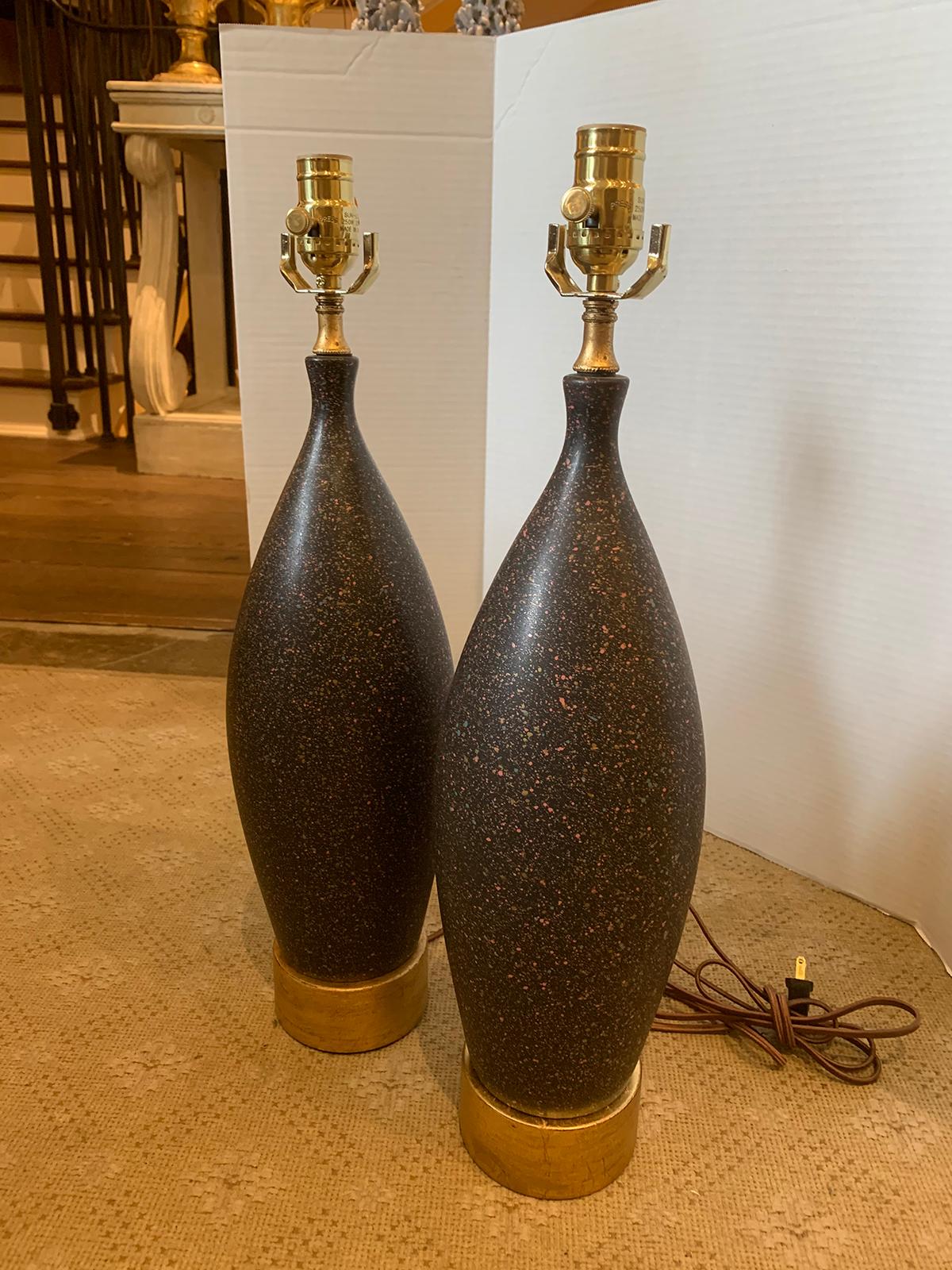 Pair of Mid-20th Century Black Pottery Lamps on Custom Gilt Bases In Good Condition In Atlanta, GA