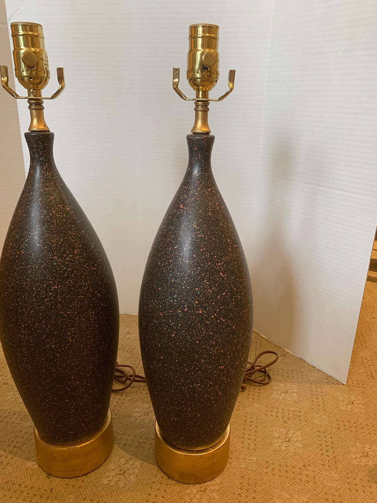 Pair of Mid-20th Century Black Pottery Lamps on Custom Gilt Bases 1