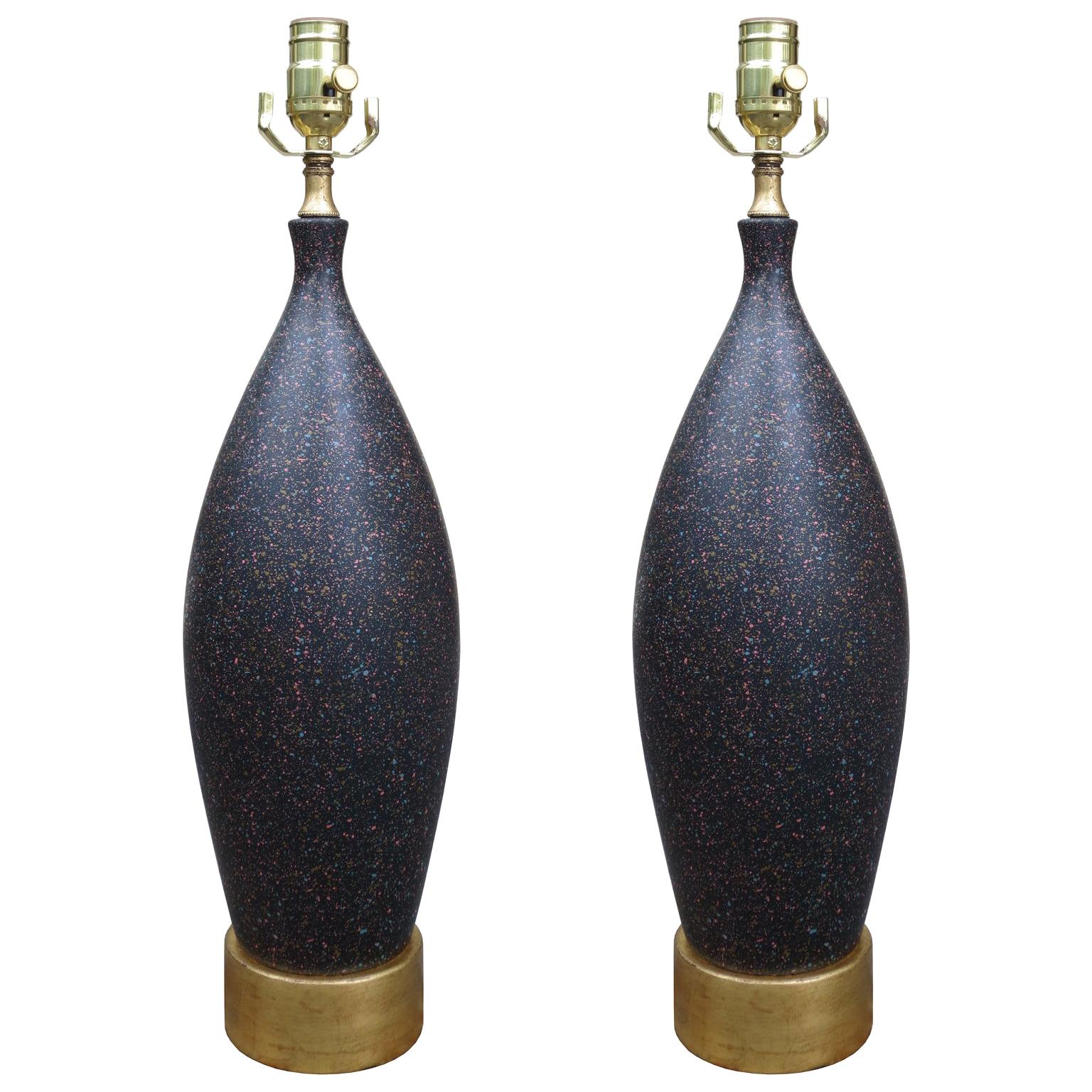 Pair of Mid-20th Century Black Pottery Lamps on Custom Gilt Bases