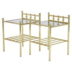 Pair of mid 20th century brass and glass side tables