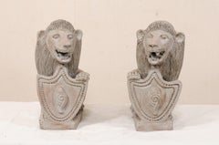 Pair of Mid-20th Century British Colonial Shielded Terracotta Lions