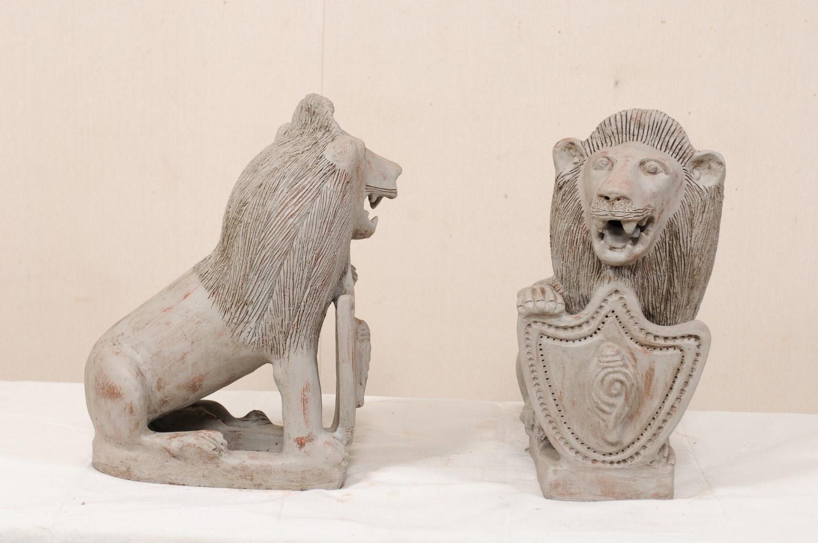 Pair of Mid-20th Century British Colonial Shielded Terracotta Lions For Sale 3