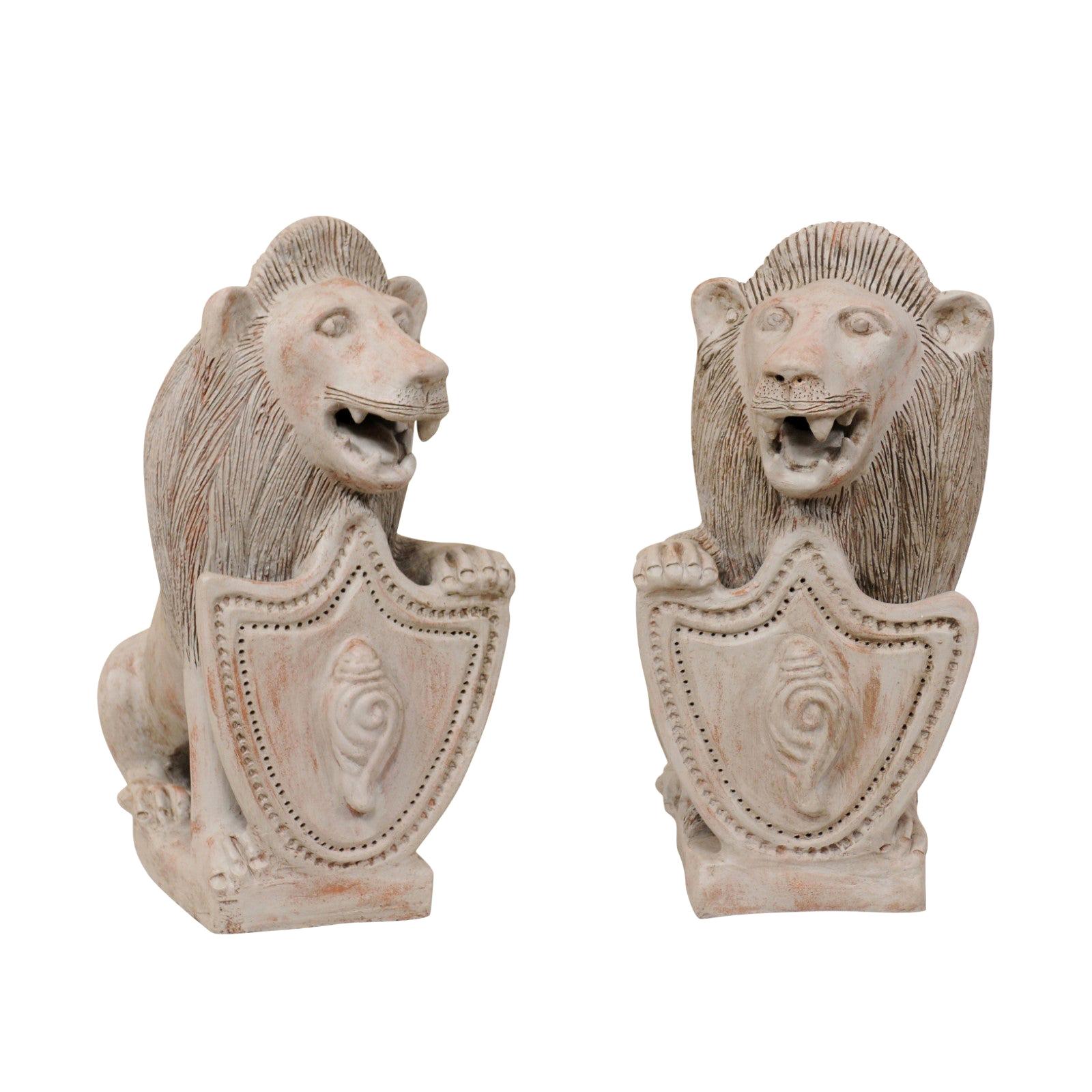 Pair of Mid-20th Century British Colonial Shielded Terracotta Lions