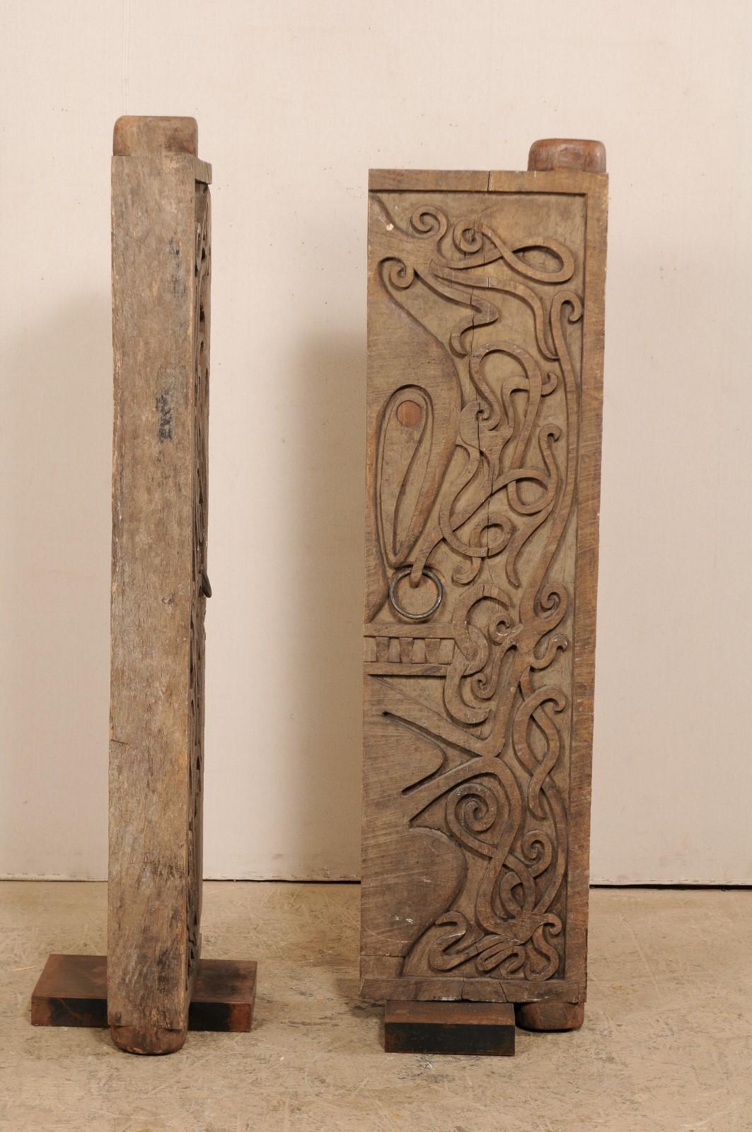 Iron Pair of Mid-20th Century Carved Doors from Borneo on Stands For Sale