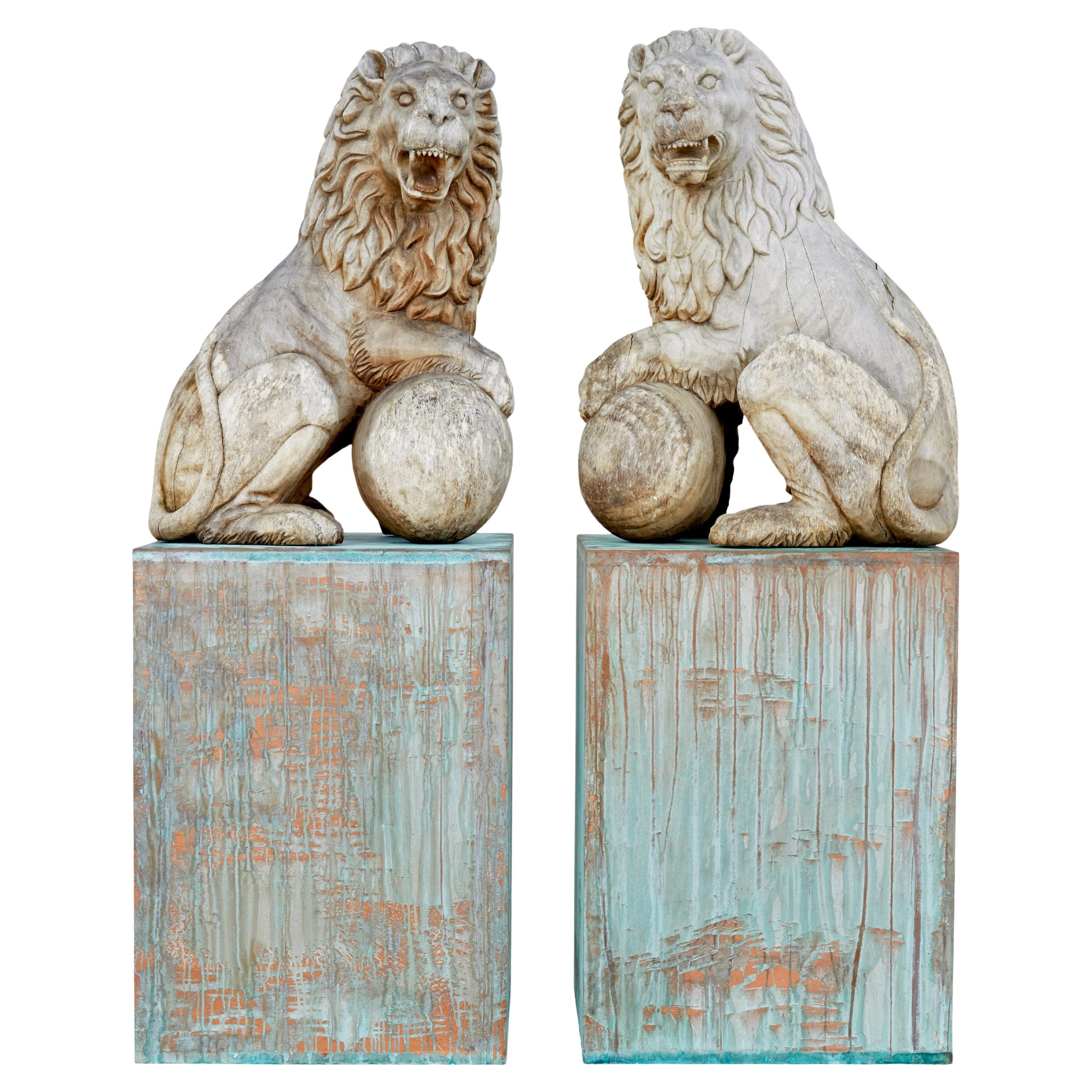 Pair of mid 20th century carved solid wood lions For Sale