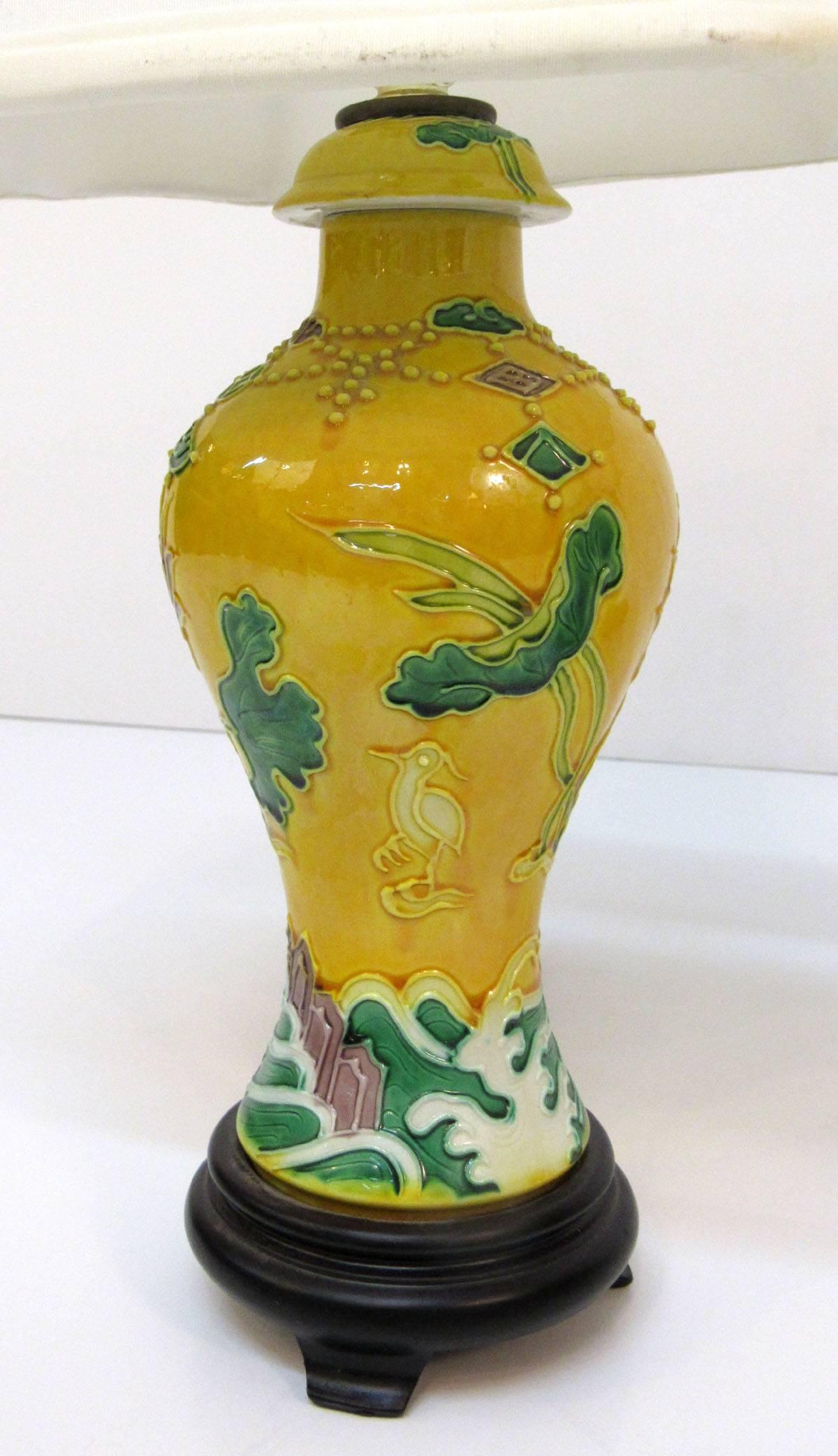 Pair of mid-20th century Chinese porcelain vases now as lamps with later hardware and bases.