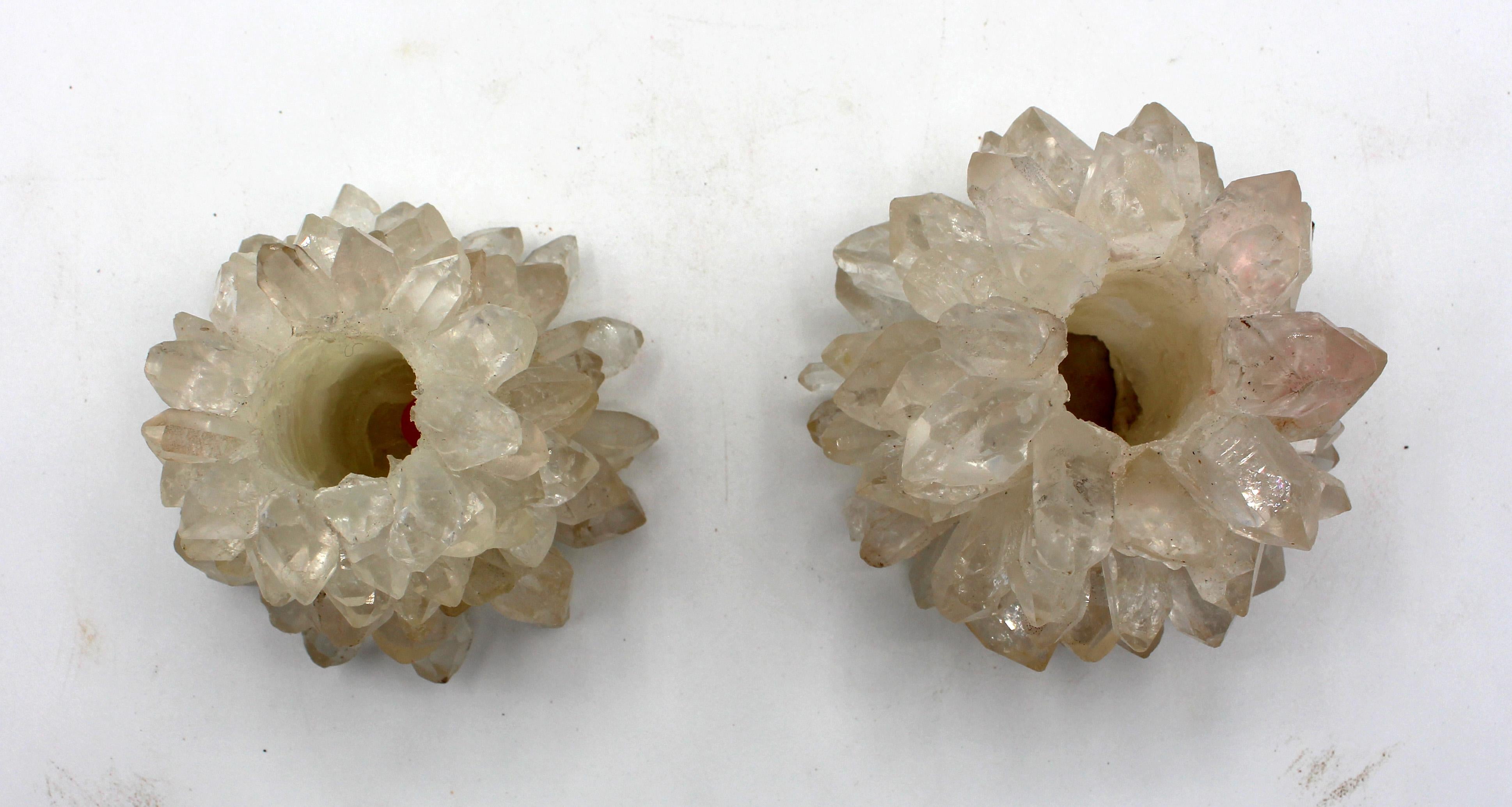 Two Mid-20th century natural rock crystal candleholders, Brazilian. Some expected minor losses to spike tips. One more conical than the other.
Each 3.75