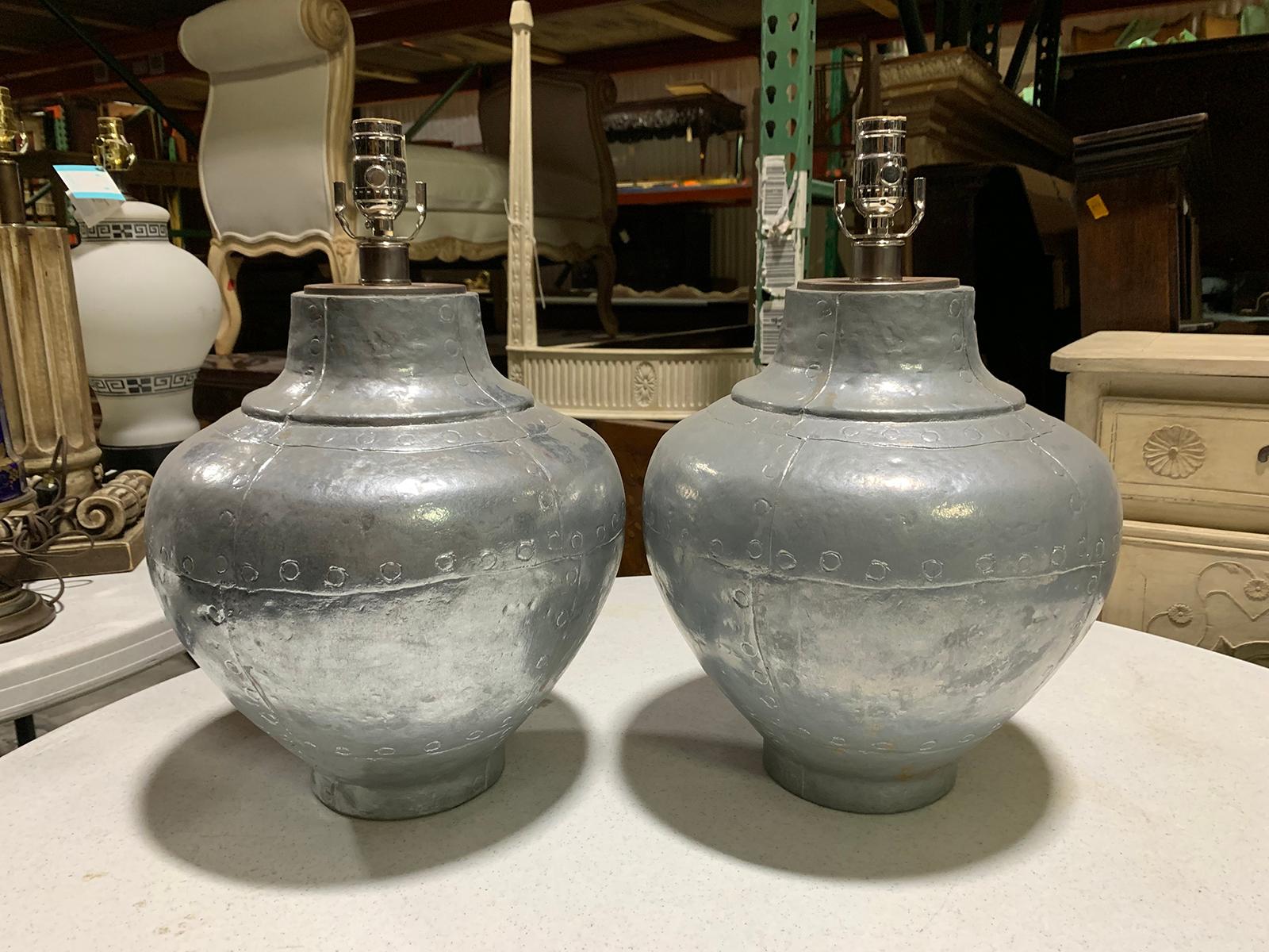 Pair of mid-20th century faux riveted metal ginger jar form lamps
New wiring.