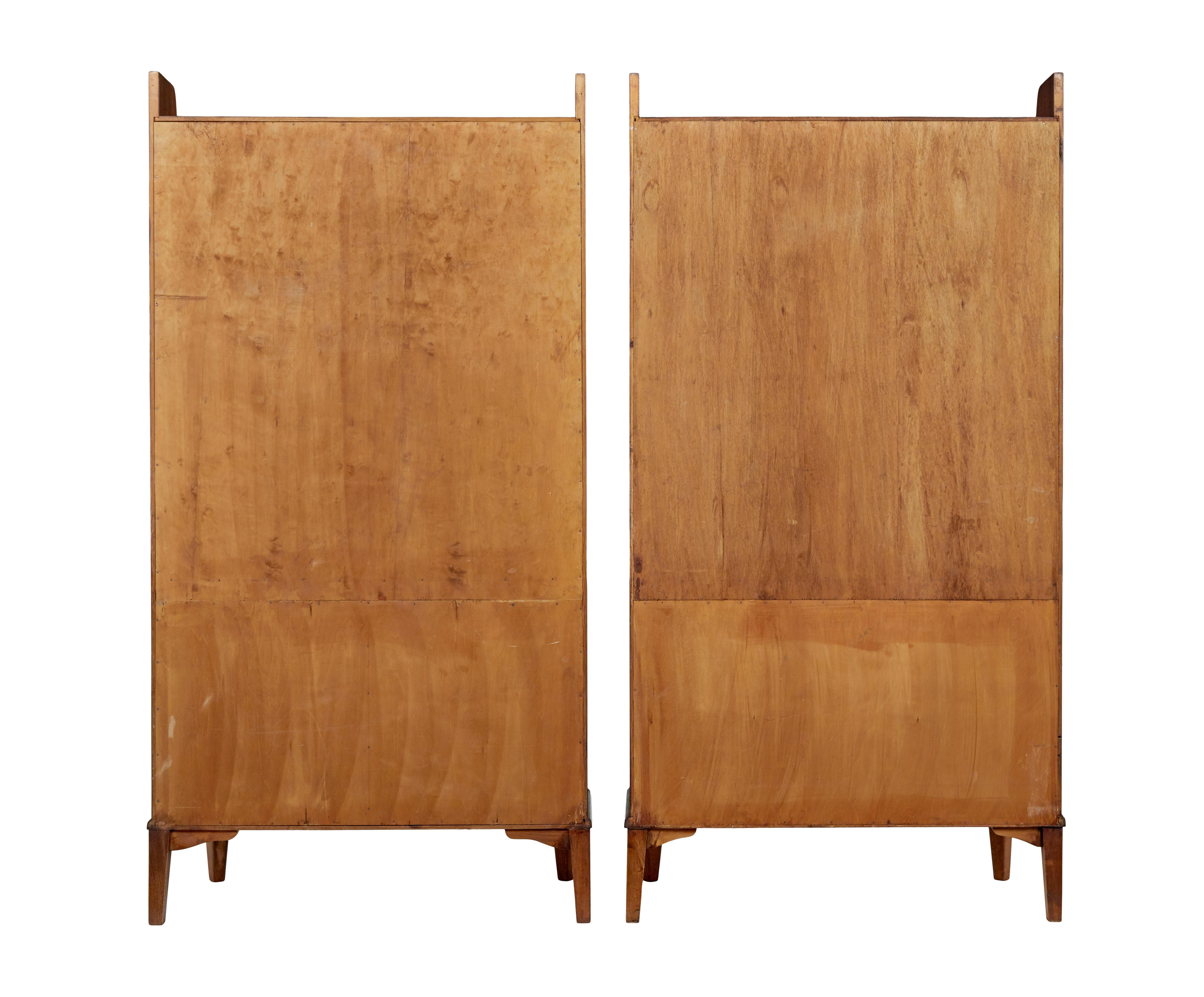 Carved Pair of mid 20th century flame mahogany Swedish bookcases by Bodafors For Sale