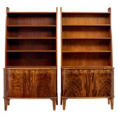 Vintage Pair of mid 20th century flame mahogany Swedish bookcases by Bodafors