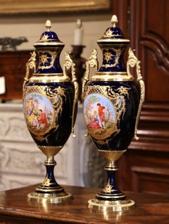 Pair of Mid-20th Century French Blue Royal Porcelain and Bronze Sèvres Urns