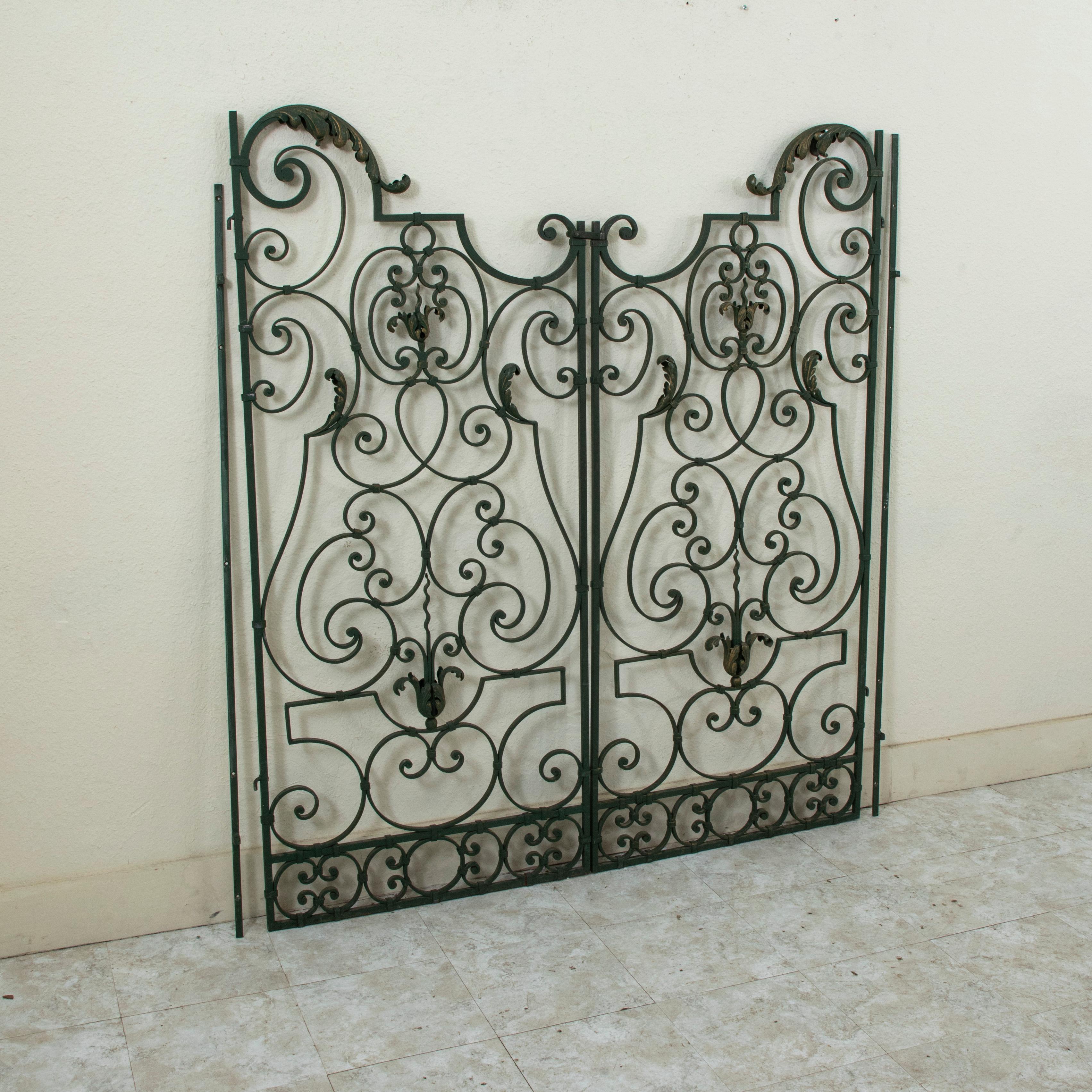 Mid-20th Century Pair of Mid 20th Century French Double Faced Wrought Iron Gates, Gold Detailing