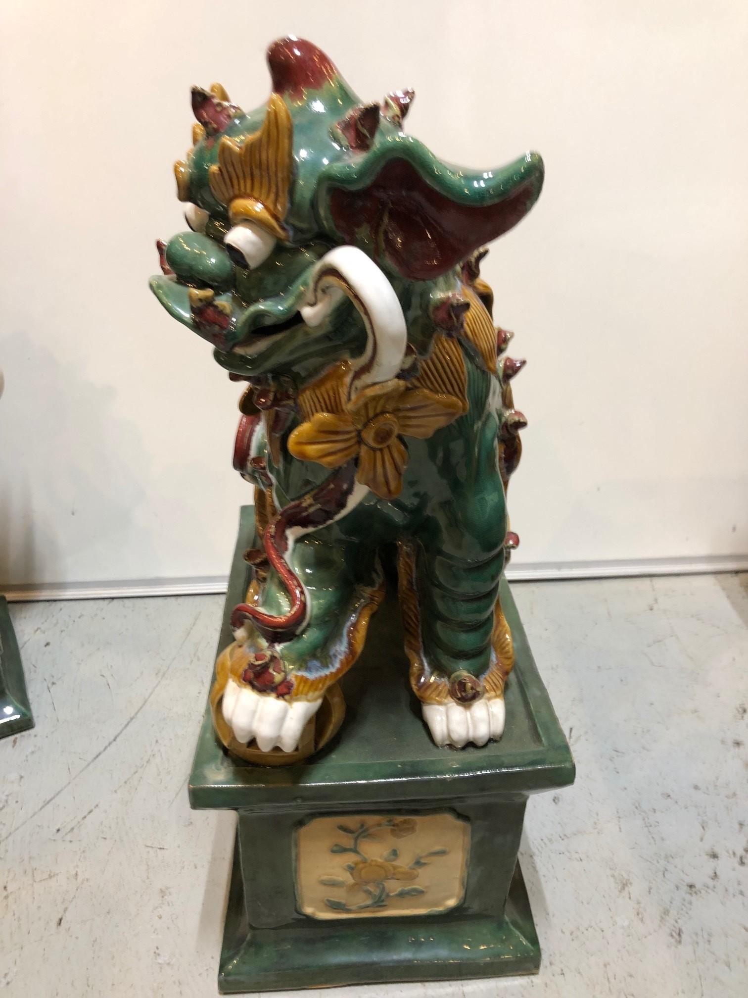 Chinese Pair of Mid 20th Century Glazed Terracotta Foo Dogs For Sale