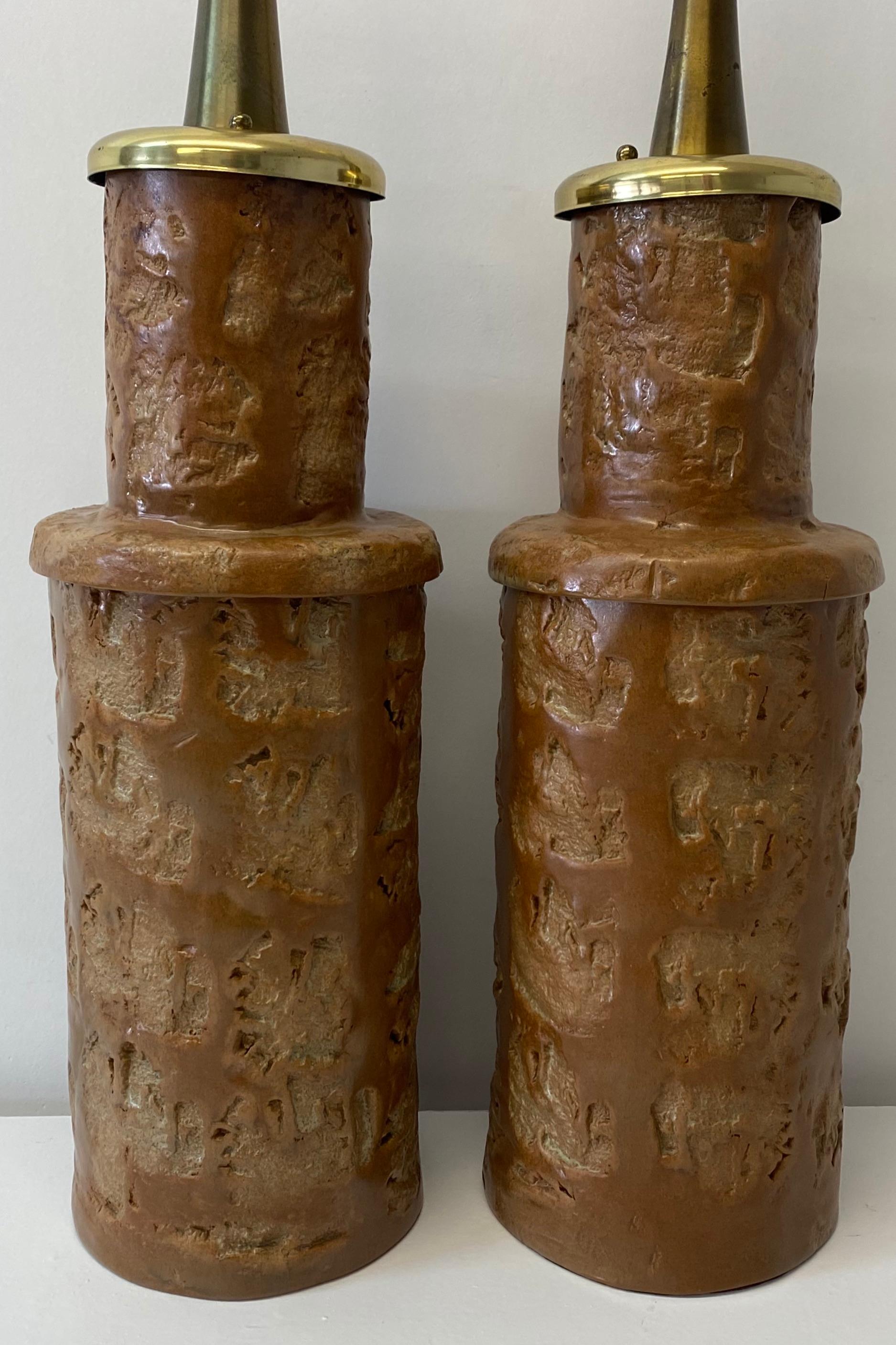 Pair of mid 20th century glazed terracotta table lamps, C.1950

Outstanding hand crafted stoneware / terracotta table lamps

These large table lamps are wired and ready to illuminate

No shades / No harps

6.75