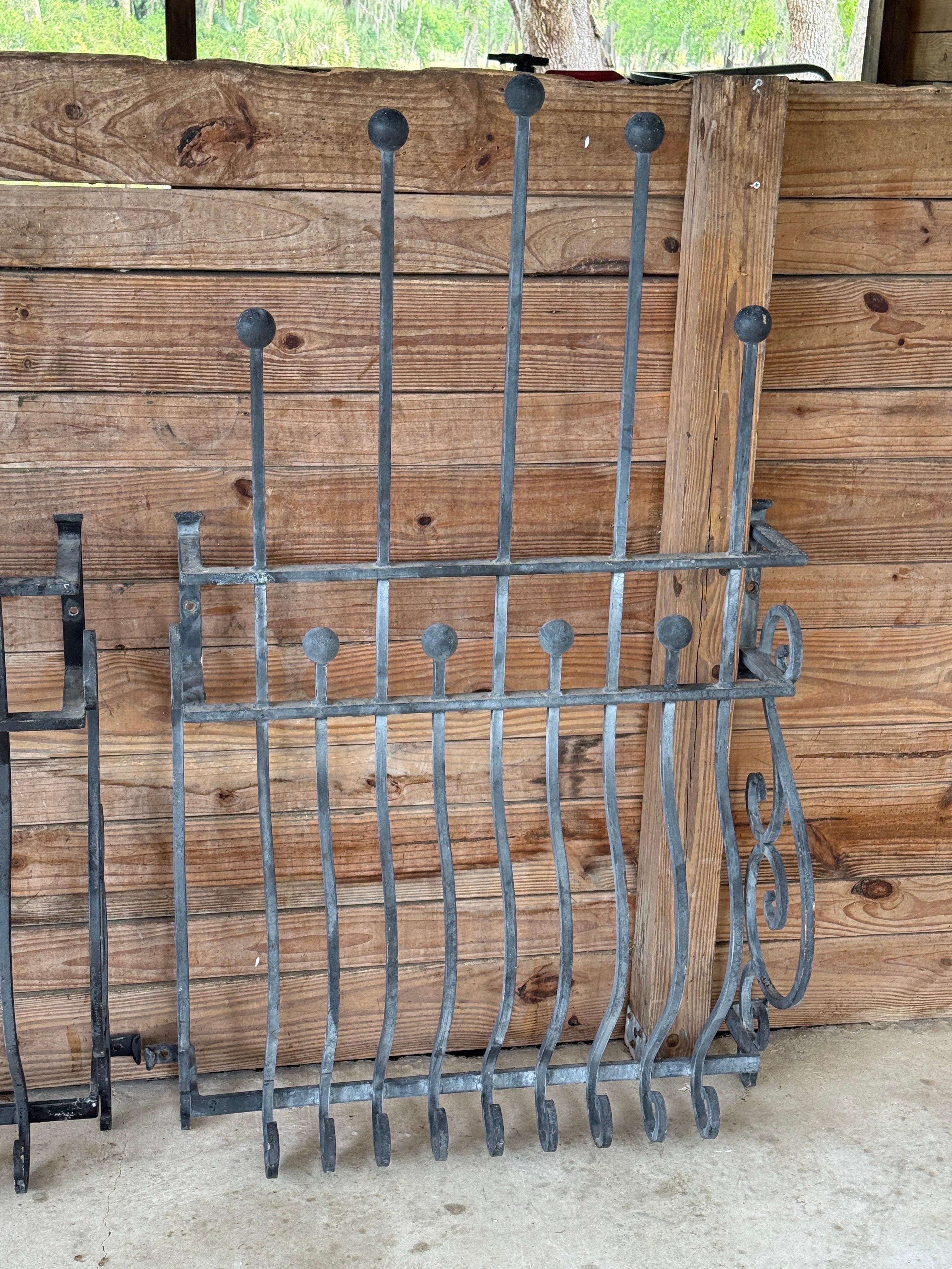 Rustic Pair of Mid-20th Century Hand-Forged Iron Window Grilles With Sculptural Scrollw