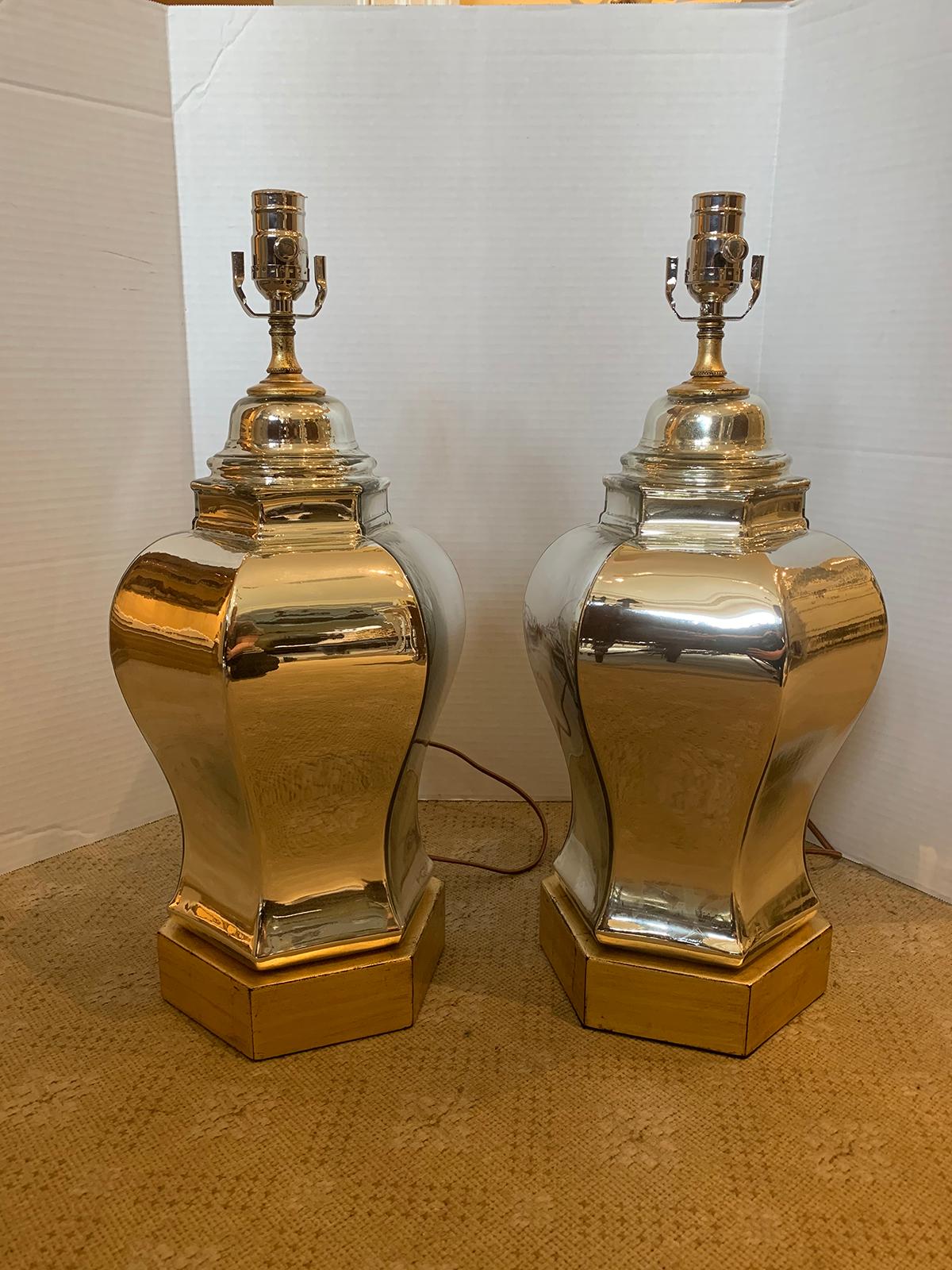 Pair of mid-20th century hexagonal mirrored glass lamps on custom bases
New wiring.