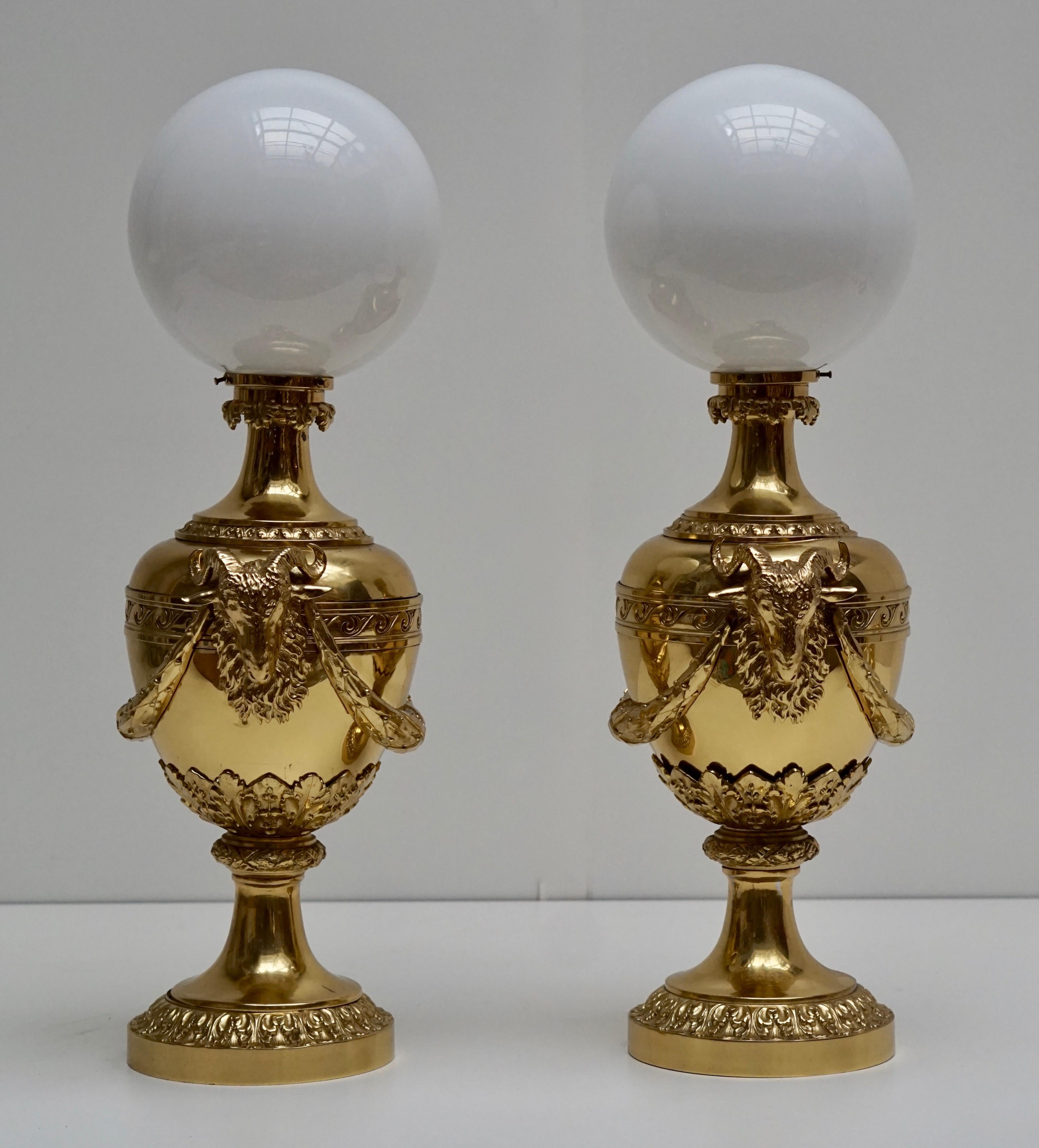 Gilt Pair of Mid-20th Century Hollywood Regency Rams Head Urn Lamps For Sale