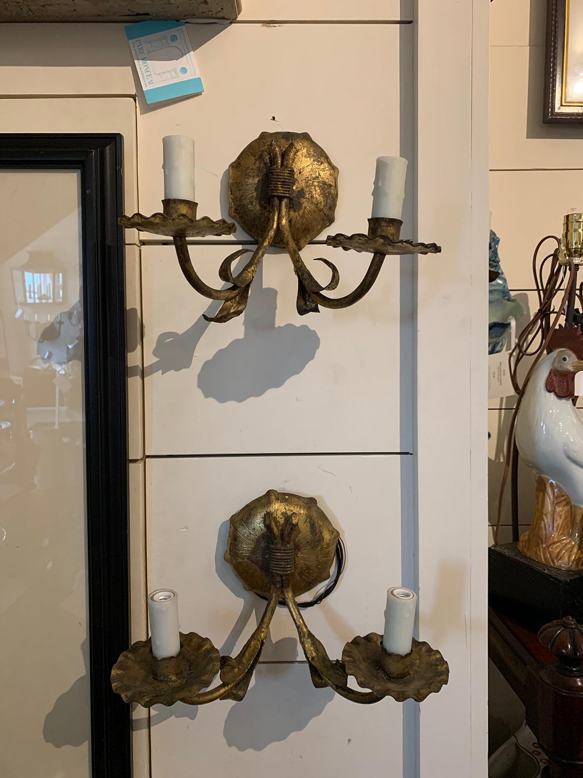 Pair of mid-20th century Italian gilt tole two-light sconces
New wiring.