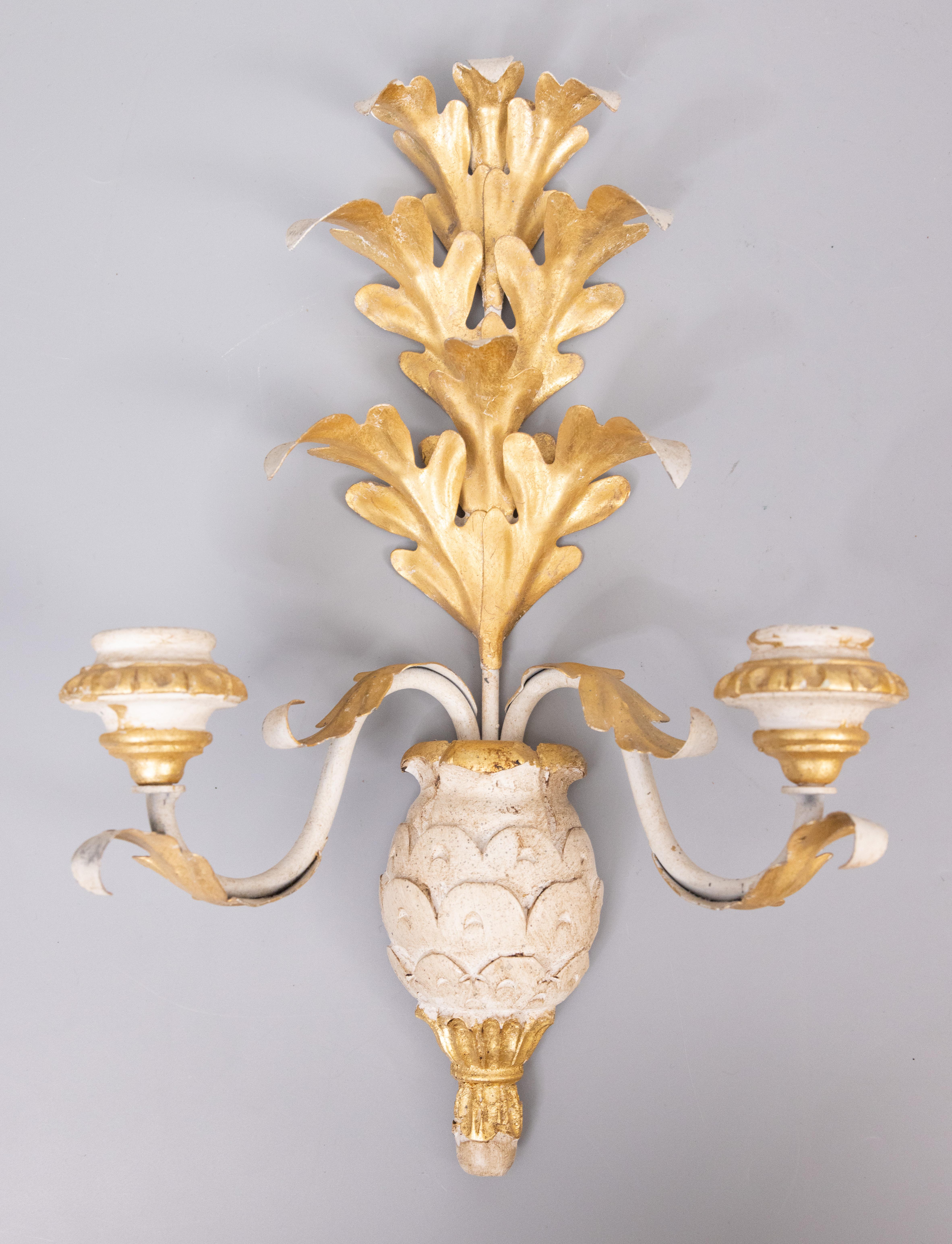 A stunning pair of Mid-20th Century vintage Italian gilded wood and tole two arm candle wall sconces. Marked 
