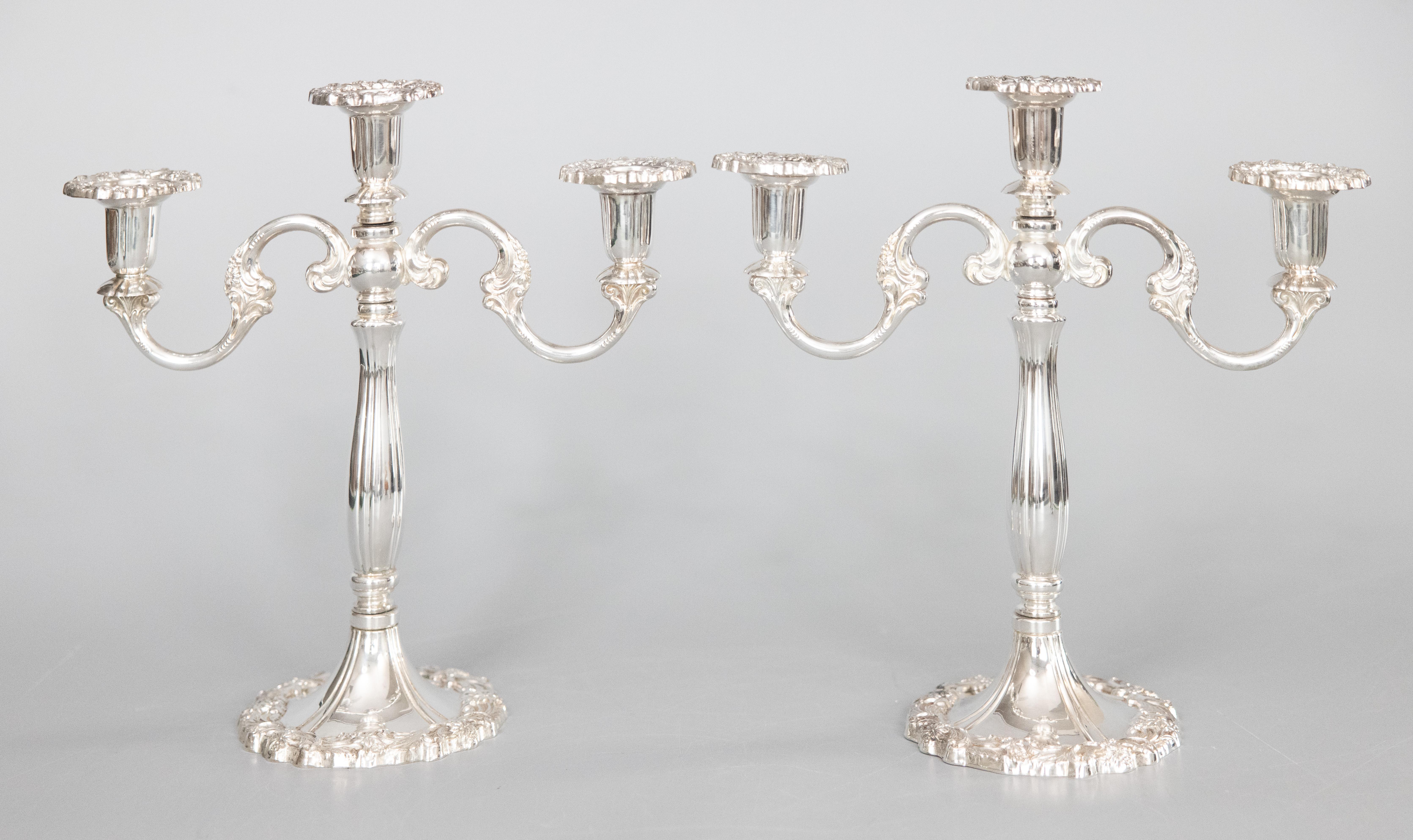 A lovely pair of Rococo style silverplate three light candelabras made in Italy, circa 1950. Marked 