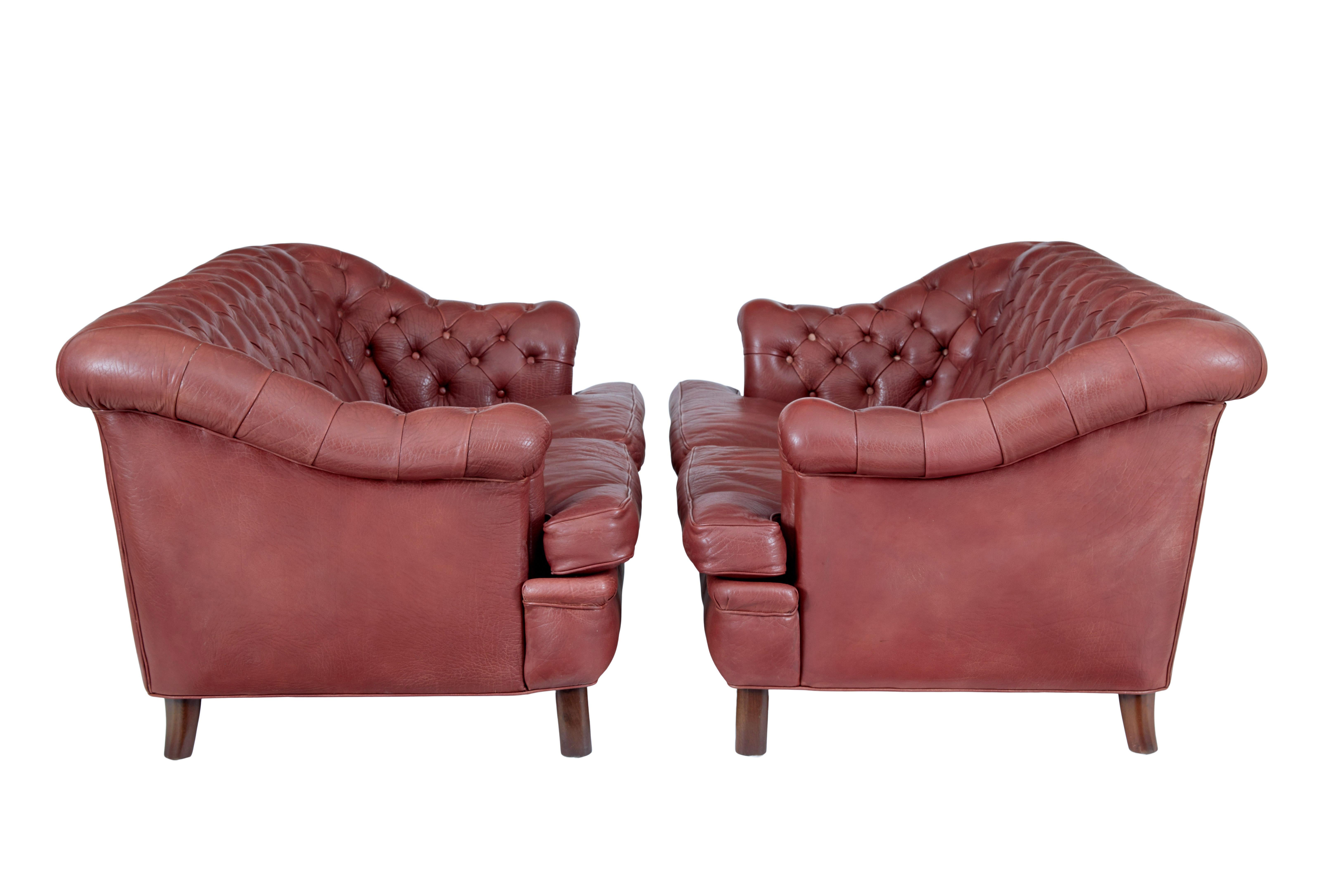 Hand-Crafted Pair of mid 20th century leather Chesterfield sofas For Sale