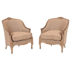 Pair of Mid 20th Century Louis XV Style Painted and Gilt Carved Bergere Chairs