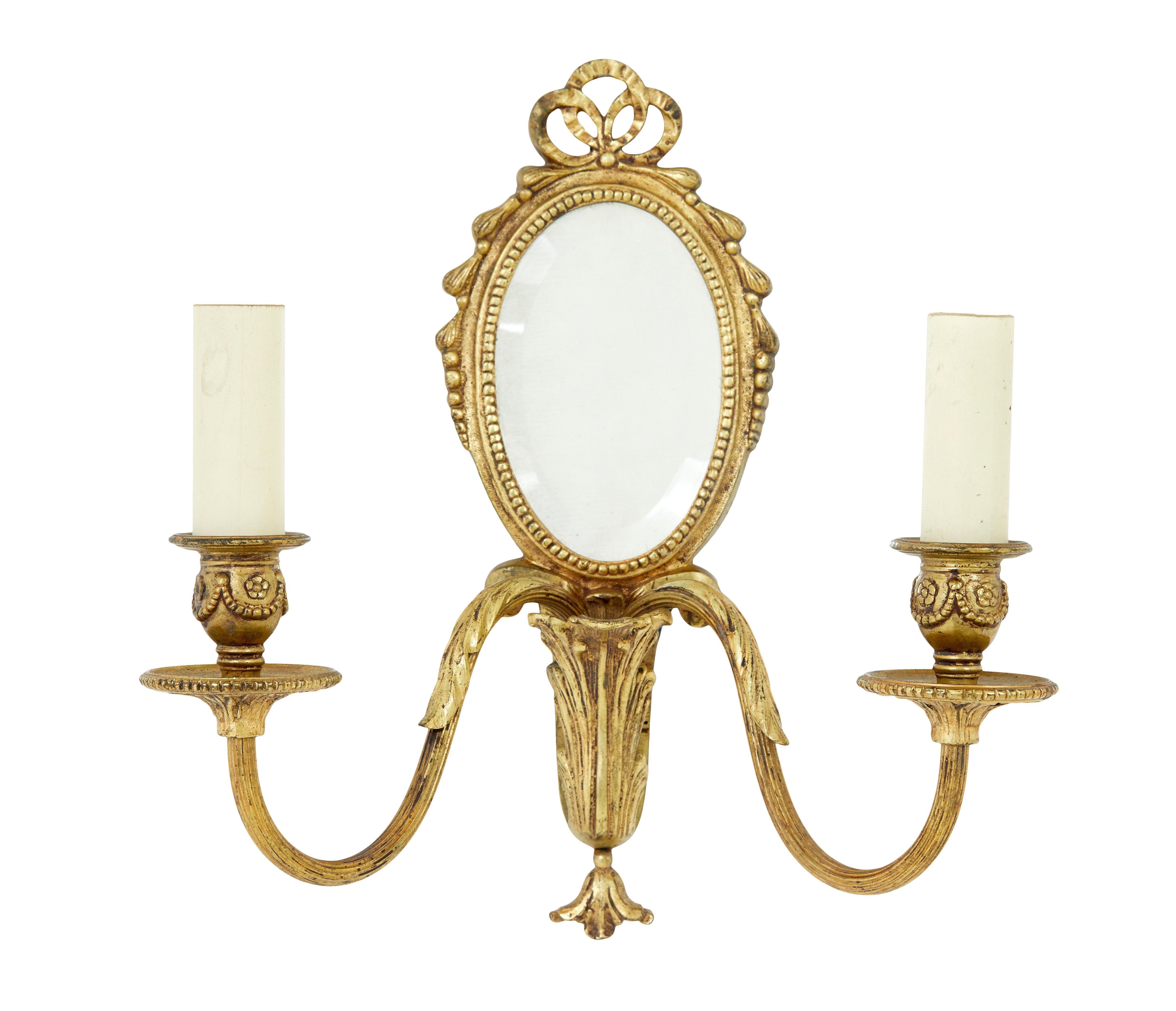 Rococo Pair of mid 20th century ormolu mirrored wall lights For Sale