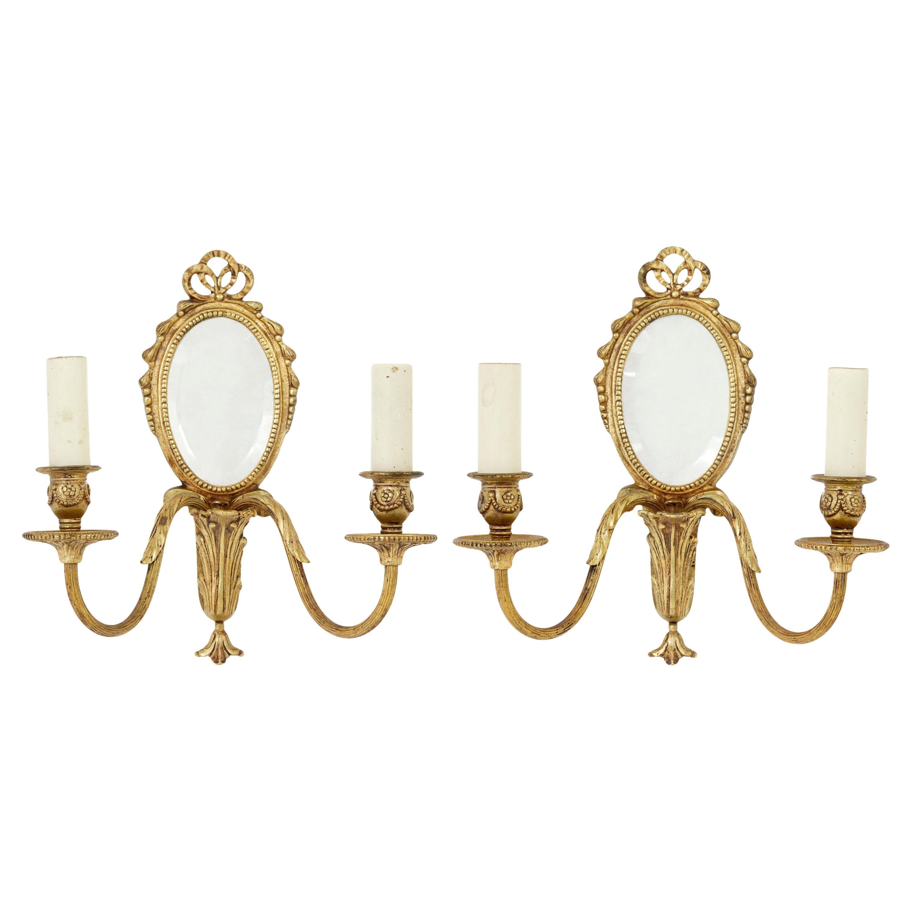 Paire d'appliques à miroir en bronze doré du milieu du 20e siècle