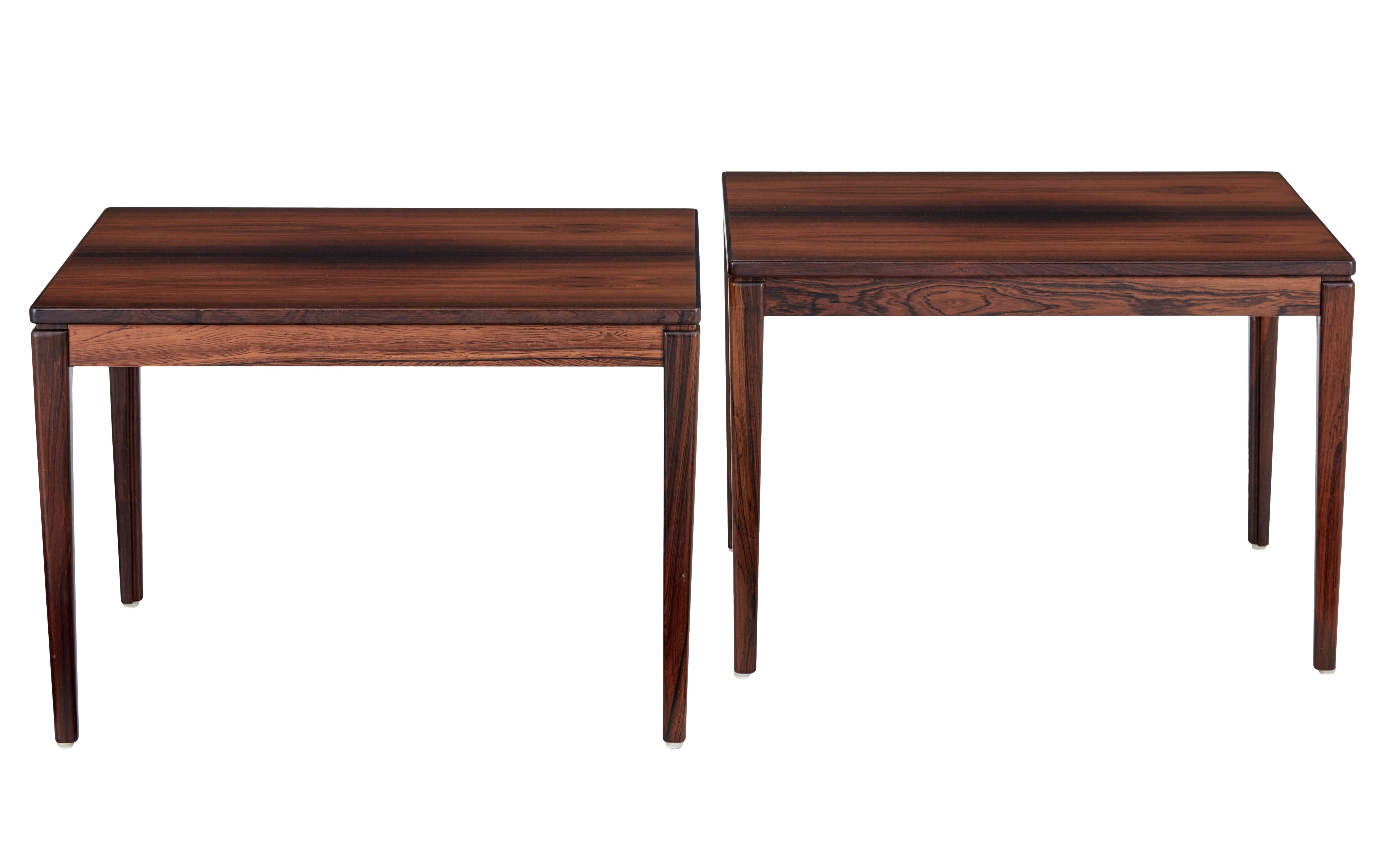 Pair of palisander side tables by Ulferts Möbler, circa 1970.

Fine quality pair of Swedish made rosewood side tables, produced by Ulferts Möbler. Simple but elegant design made from striking veneers, standing on tapering legs.

Many
