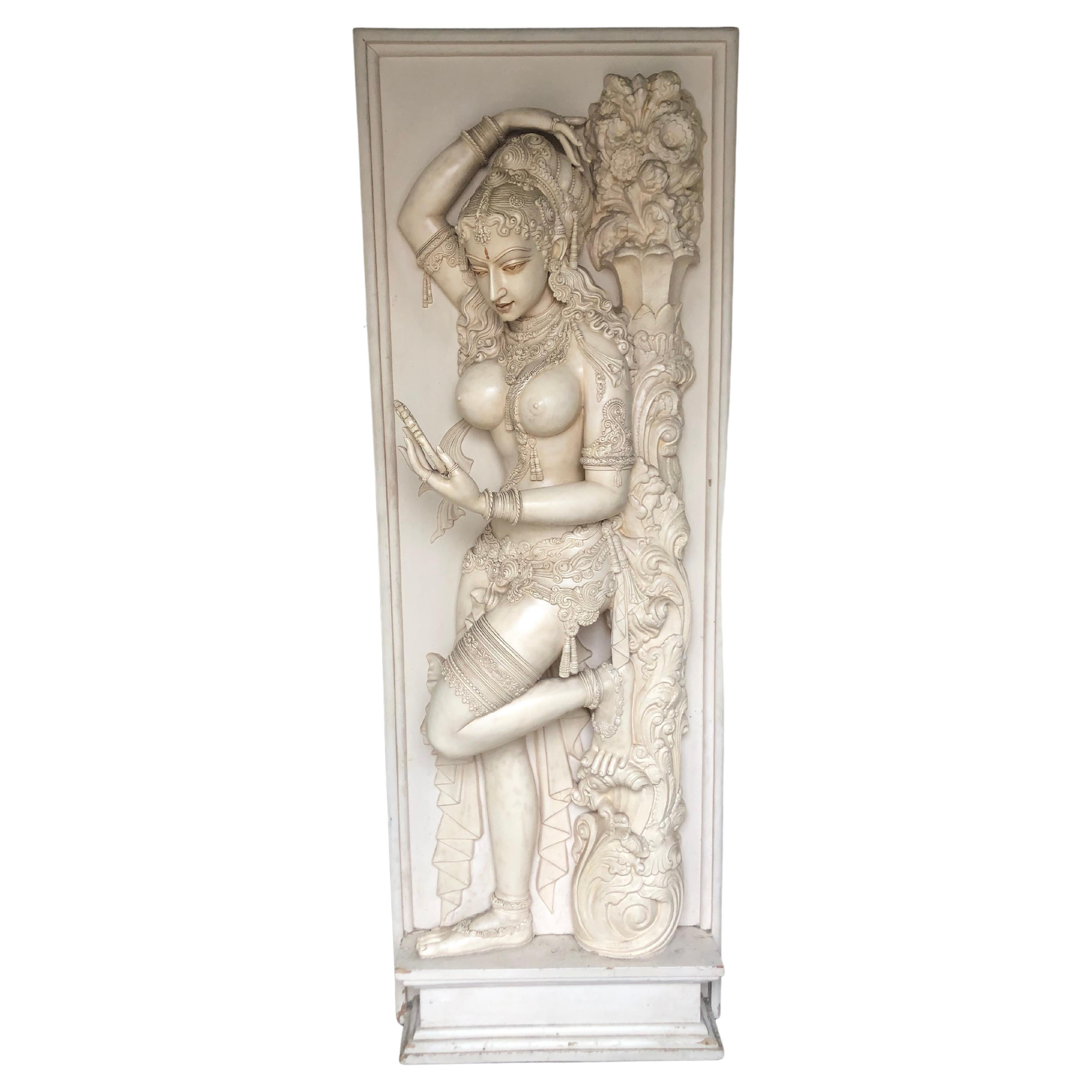 A fabulous pair of panels of two exotic Indian dancers with incredible details. These two panels were molded from original wood carved panels in India and shipped over to the united states in the late 60s. The detailing is amazing and hard to